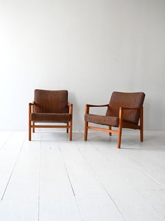Coppia di poltrone vintage scandinave originali in teak