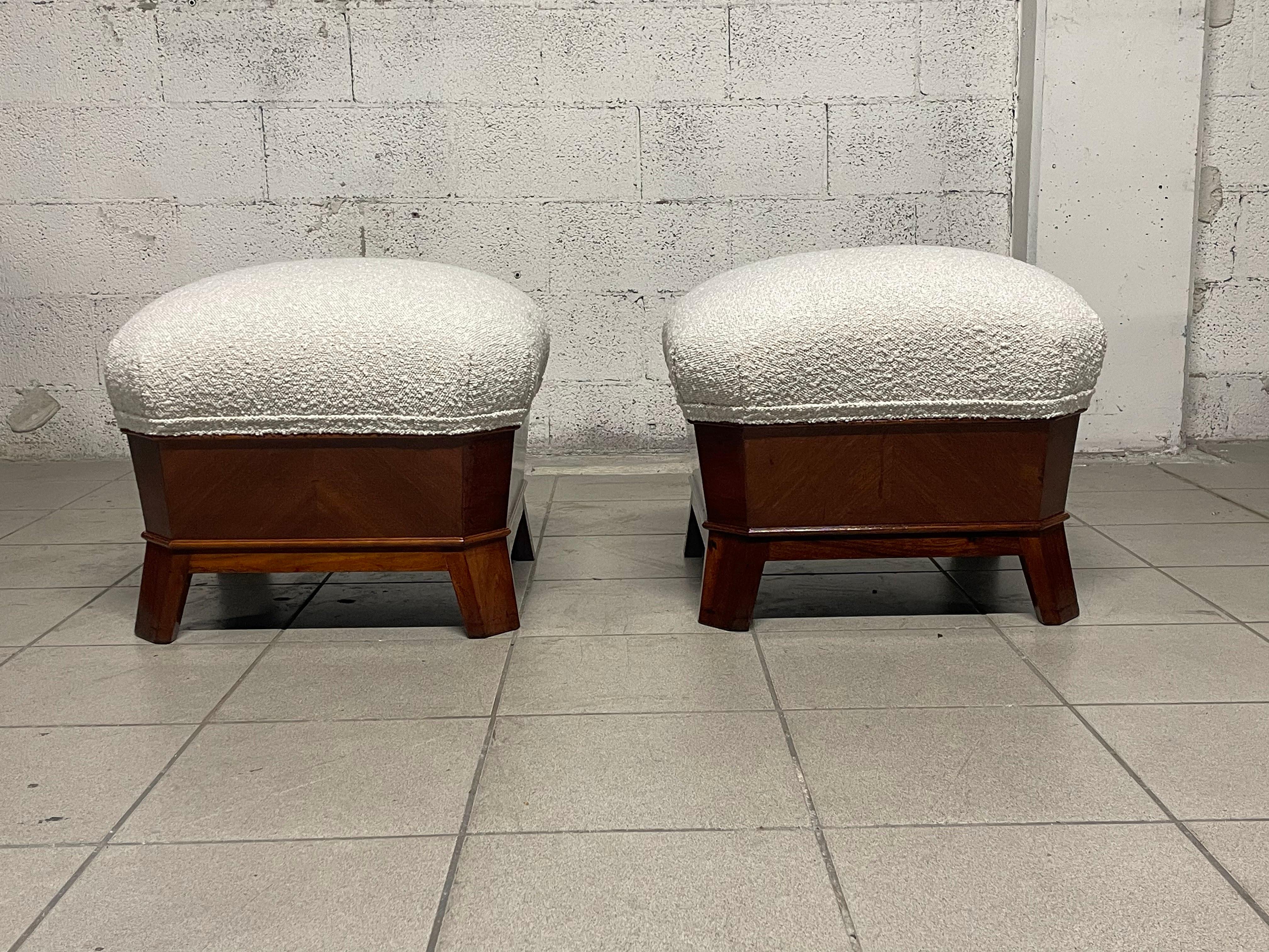 Pair of large 1930s poufs made of mahogany wood.

The pair was completely restored in the wooden parts, and the upholstery was renewed with a natural white bouclé fabric.