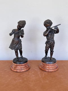 Pair of bronze and marble child sculptures, "Serenade in Two Voices," 1970s