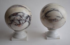 Pair of medicean marble breccia spheres, made in Italy