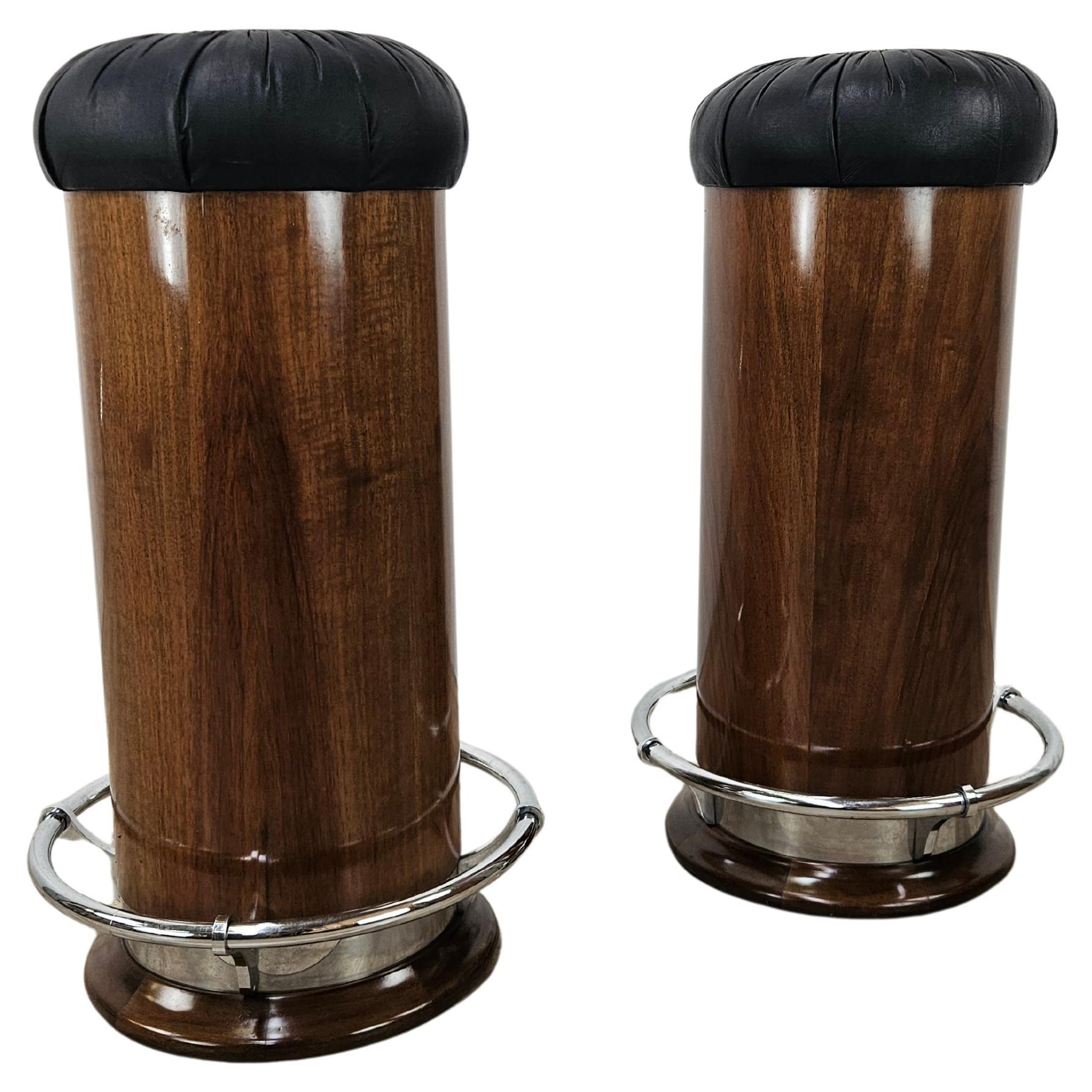 Pair of 1970s Mid Century bar stools in walnut and leather
