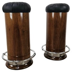 Pair of 1970s Mid Century bar stools in walnut and leather