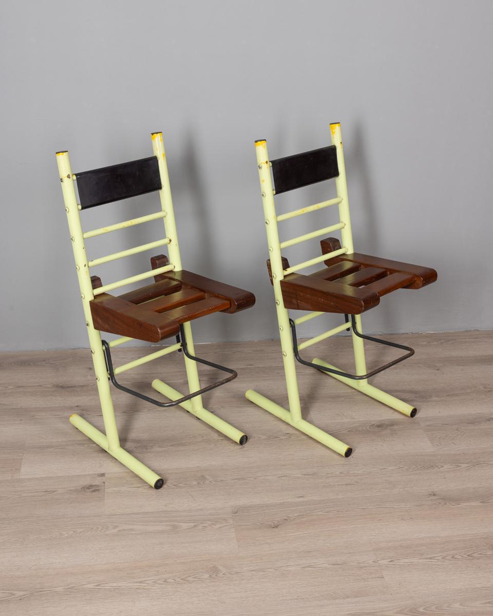 Pair of vintage 1970s iron and wood stools Italian design.

CONDITION:
In good condition, show signs of wear and tear given by time

SIZING: 
Height 93 cm; Width 38 cm; Length 50 cm

MATERIALS: 
Iron wood and plastic

YEAR MANUFACTURED: 
1970s