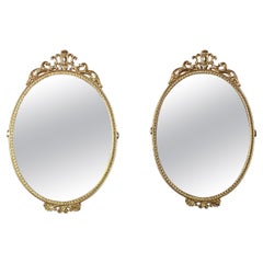 Vintage Coppia di specchi Ovali Dorati in Stile Barocco, Italia, anni '70