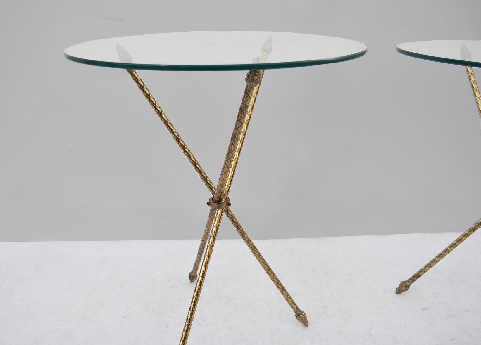 Pair of 1950s Coffee Tables, Made in Italy. 
They are made of crystal and hand-engraved brass. The crystal top is ground. 
Condition is perfect, some slight signs of use due to time. 
The price of shipping is for the Italian territory, for the