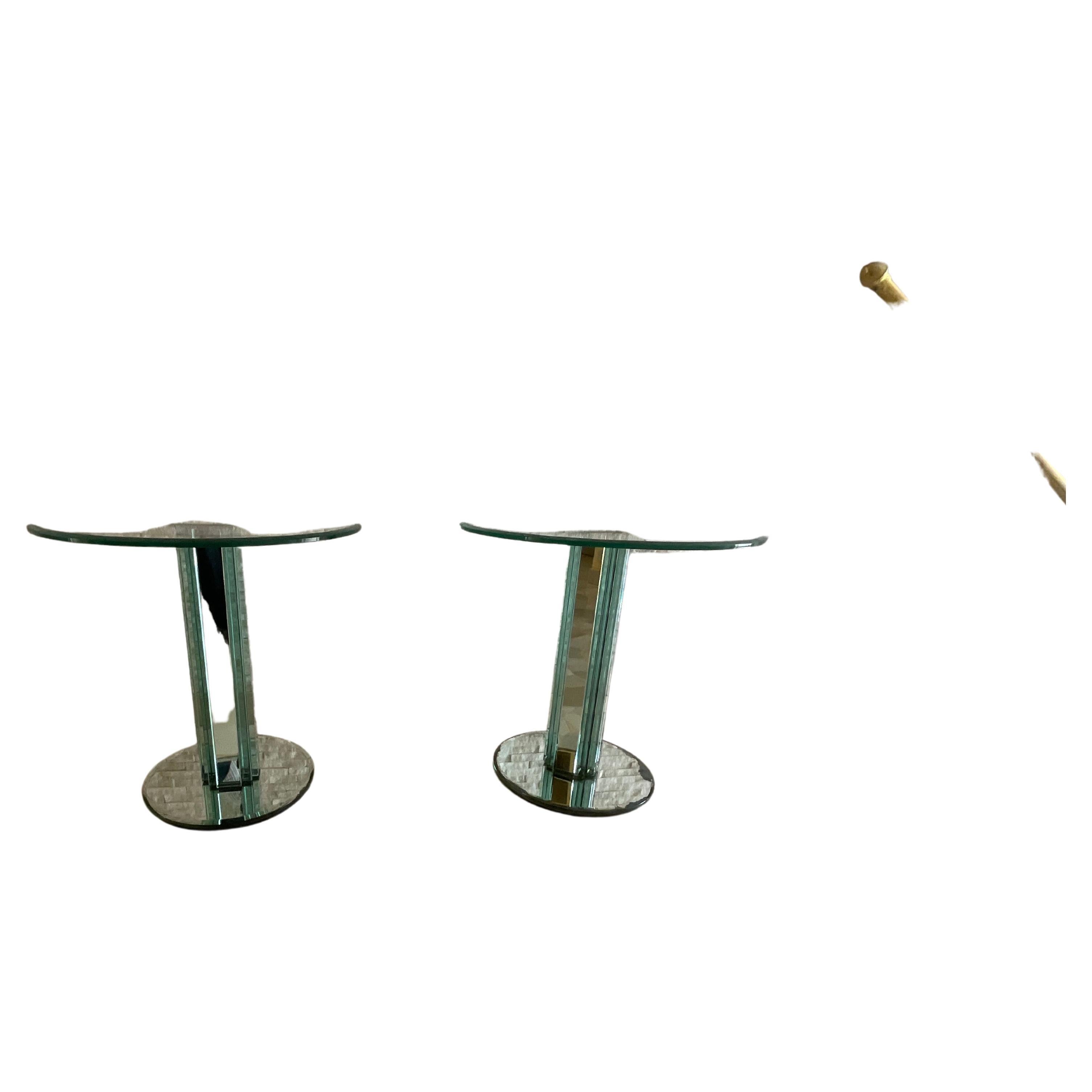A pair of thick crystal coffee tables with excellent quality metal frame , model GOLF, designed by designer Luigi Massoni and executed by the firm Gallotti & Radice in 1980.
Moisture stains can be seen in some areas of the mirrored parts, but the