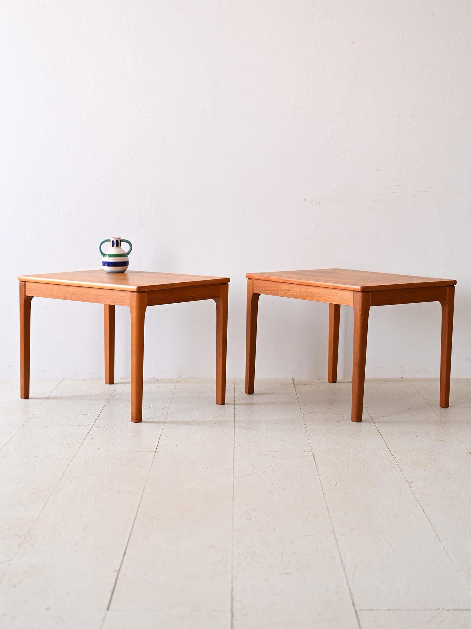 1960s teak coffee table.

The solid structure with square lines captures the essential essence of Nordic style, while teak gives it warmth and elegance.
They feature a rectangular top with slightly rounded corners, adding a soft touch to the design