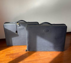 Pair of rigid suitcases, designed by Ettore Bugatti for Poltrona Frau, 1990