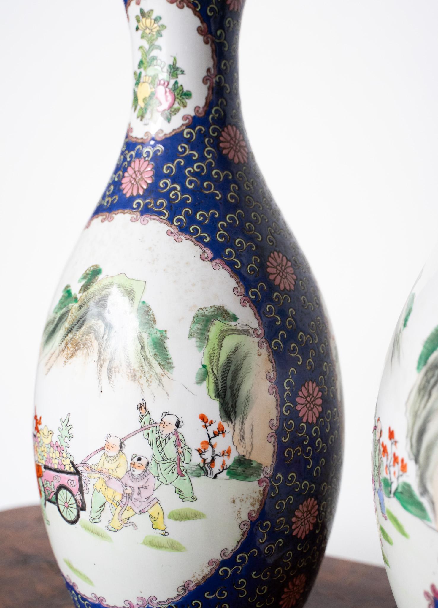 Pair Of Chinese Porcelain Vases Decorated With Various Colors For Sale 1