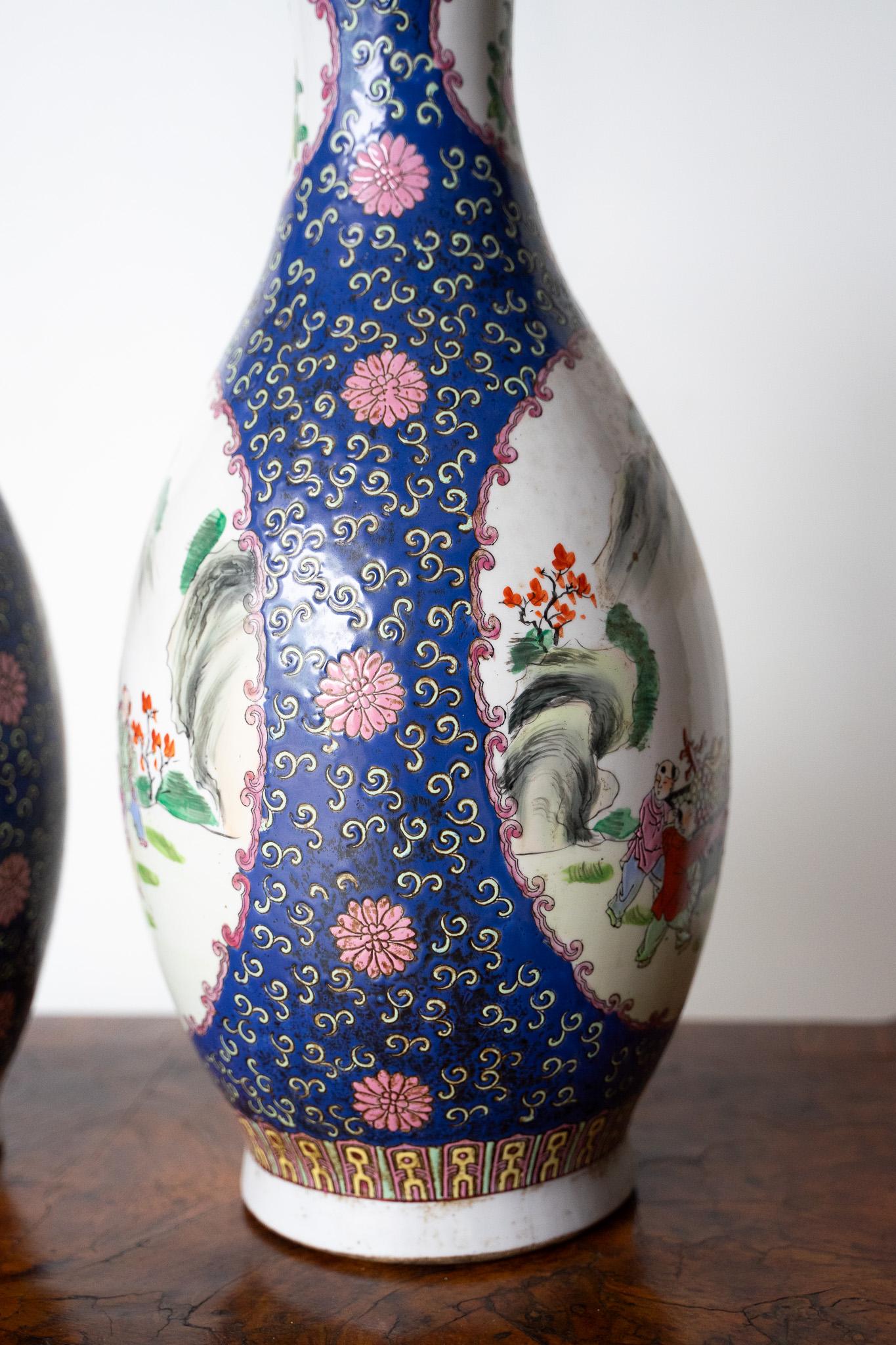 Pair Of Chinese Porcelain Vases Decorated With Various Colors For Sale 2