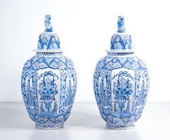 Pair of lidded earthenware vases from DELFT. Holland, late 19th century