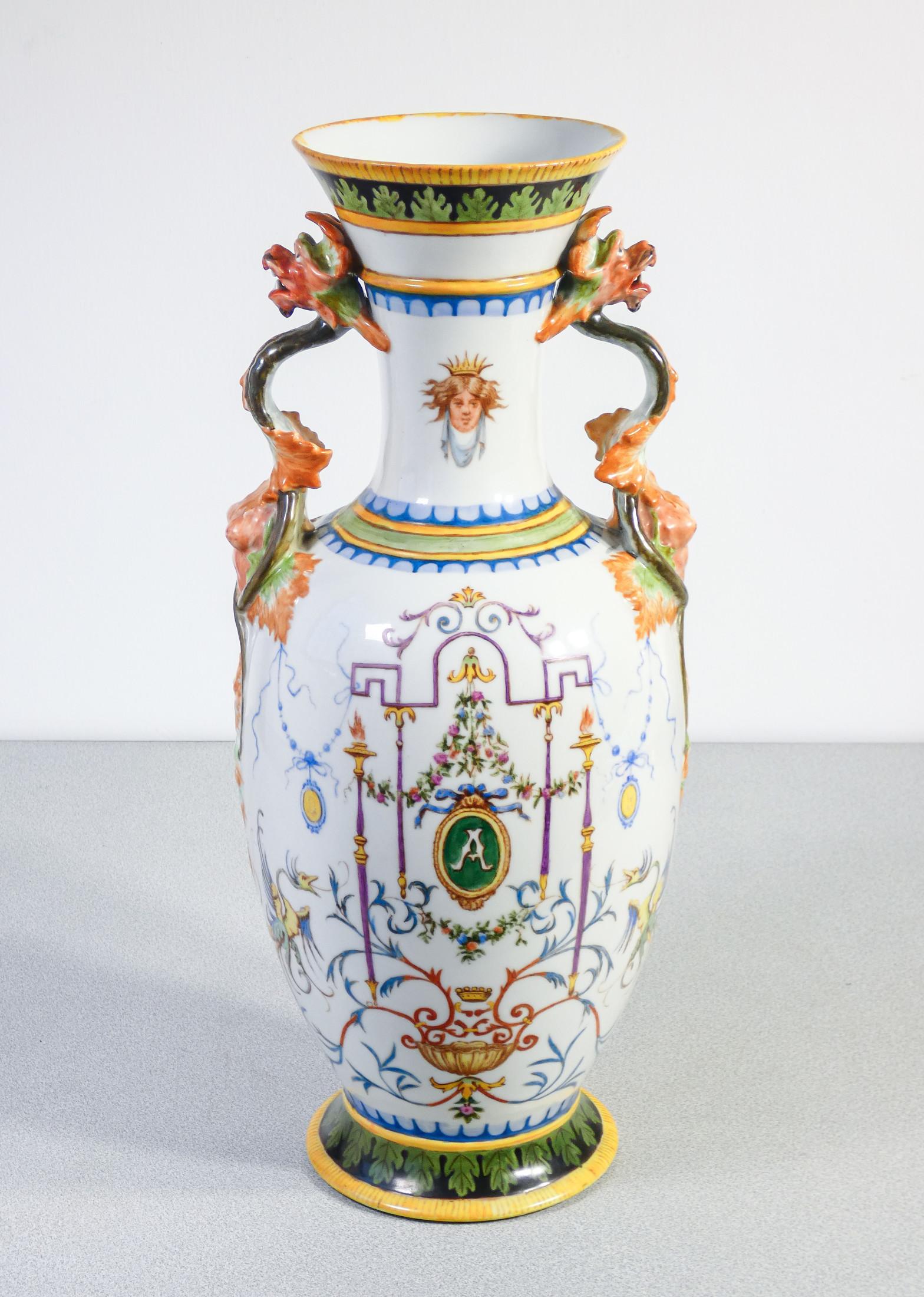 Italian Pair of painted ceramic vases with grotesques, carvings on handles. 1887 For Sale