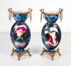 Pair of glazed and hand-painted ceramic and bronze vases. Late 19th century