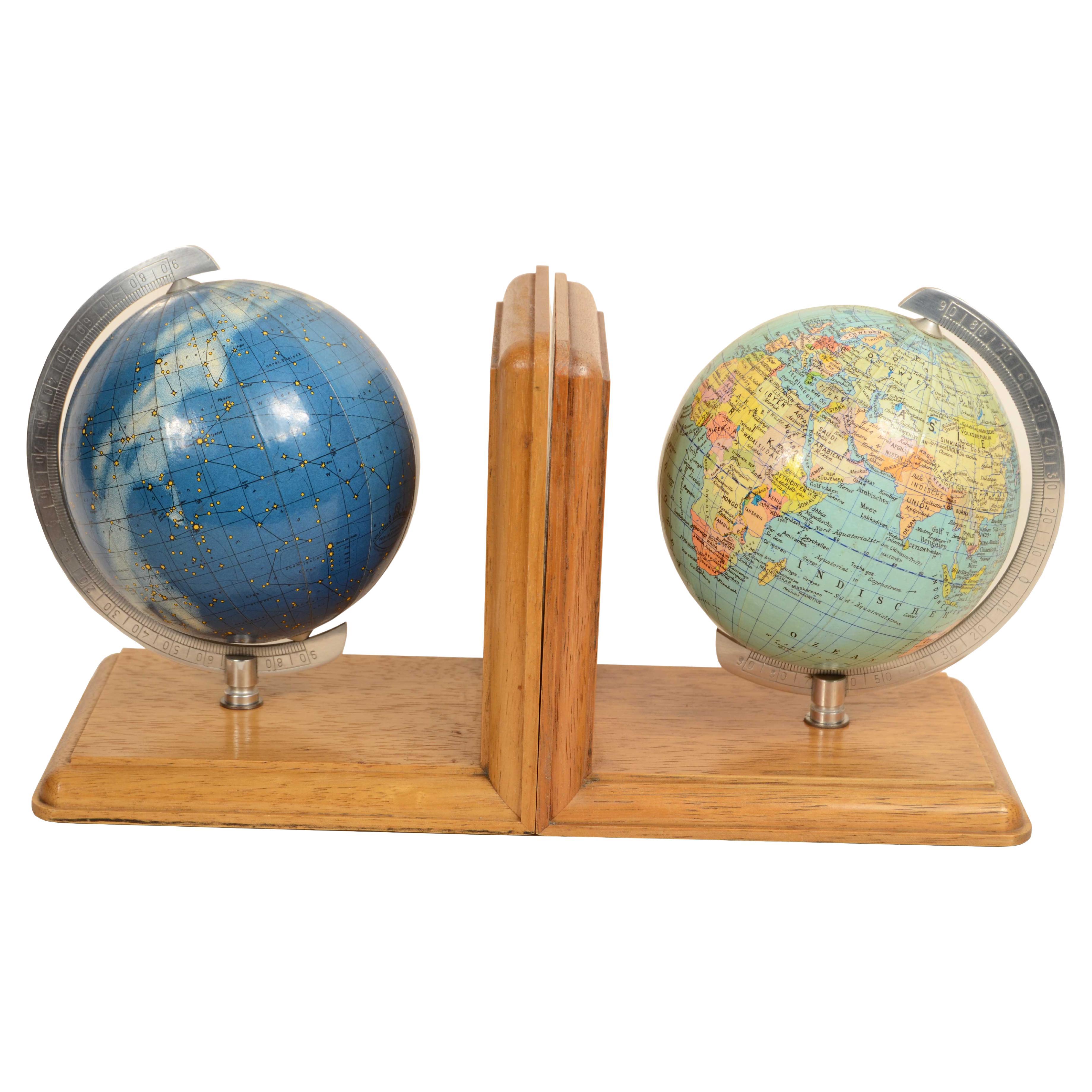 Pair bookends oak wood base with terrestrial and celestial globes Germany 1950s