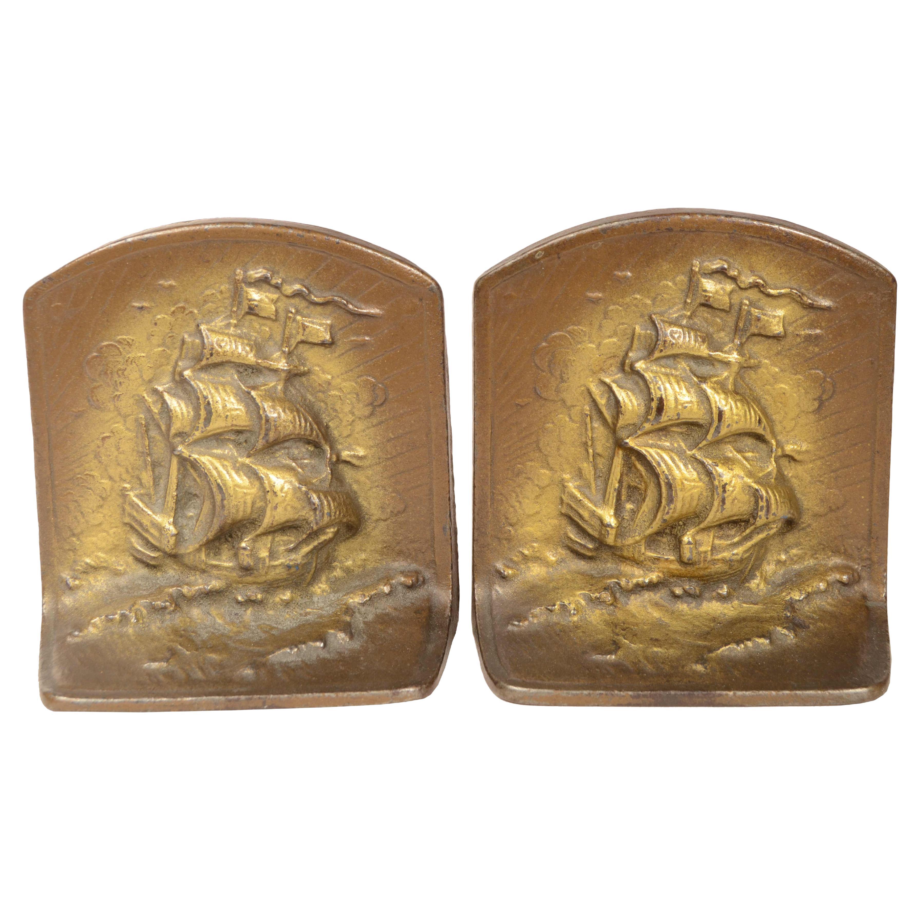 Pair of cast iron bronze patinated bookends depicting 1930s sailing ship
