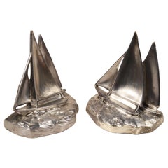 Pair of white metal cast bookends of 2 sailboats sailing 1930s