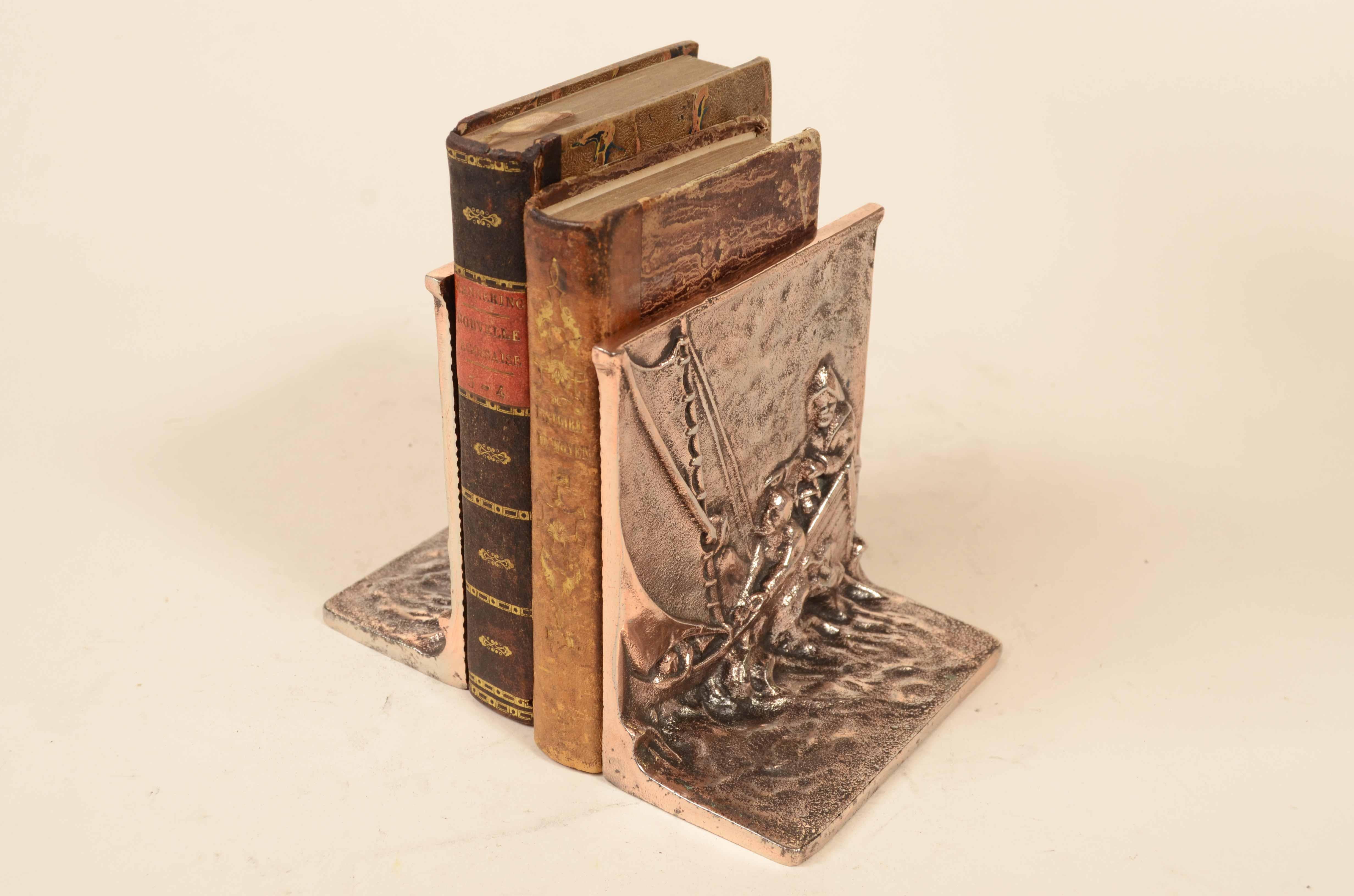 Bronze Pair bronze bookends of sailors sailing on sailboat 1930s For Sale