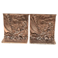 Pareja de sujetalibros de bronce de marineros navegando en un velero Años 30