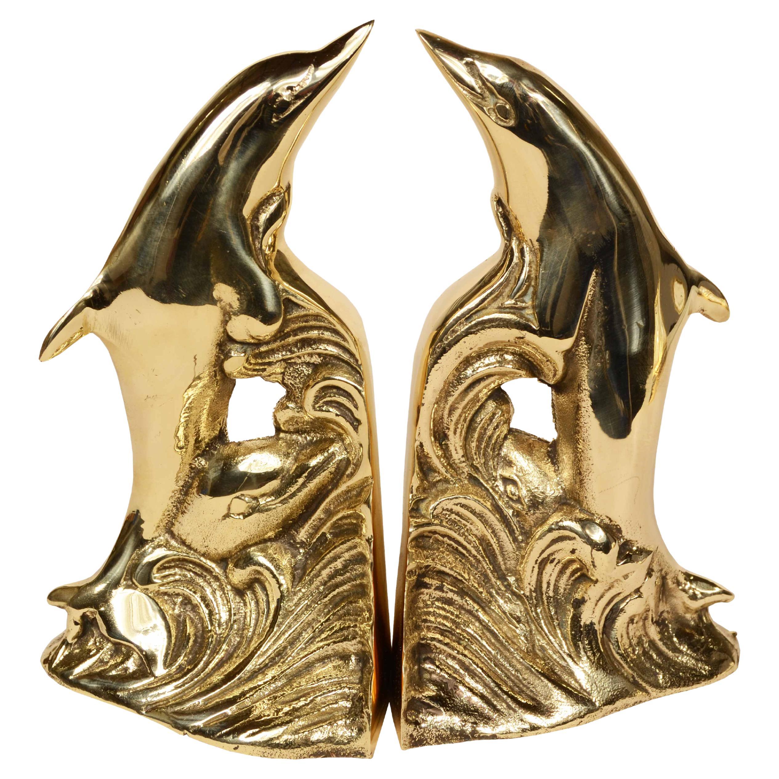 Pair of brass bookends depicting dolphins English manufacture 1950s