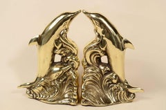 Pair brass bookends depicting dolphins English manufacture 1950s