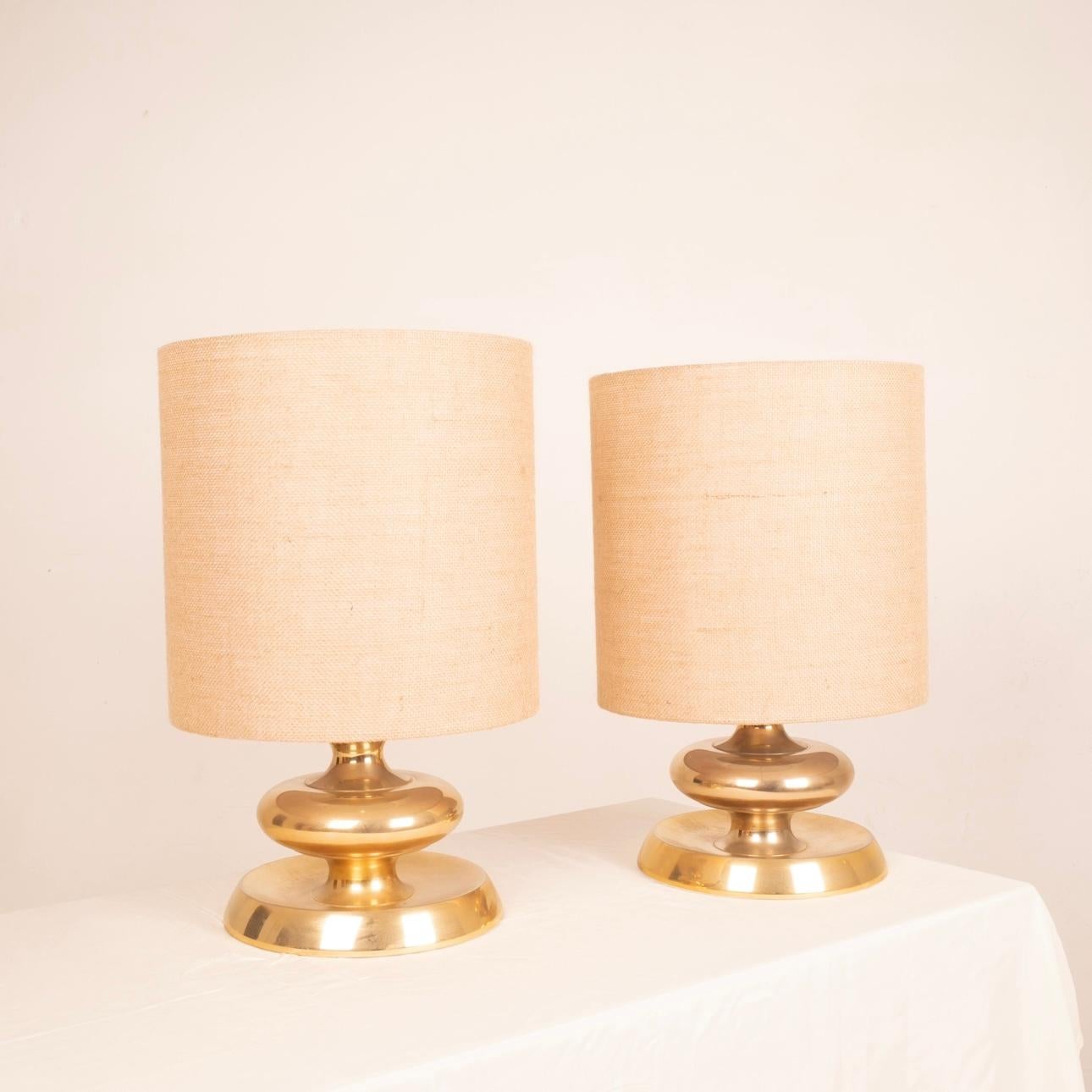 Extraordinary and very rare pair of lamps model C-363 in the most precious version, bathed in 24k gold, and produced by the well-known company Luci Italia in the late 60s and early 70s.
The lamps are in excellent original condition as pictured, with