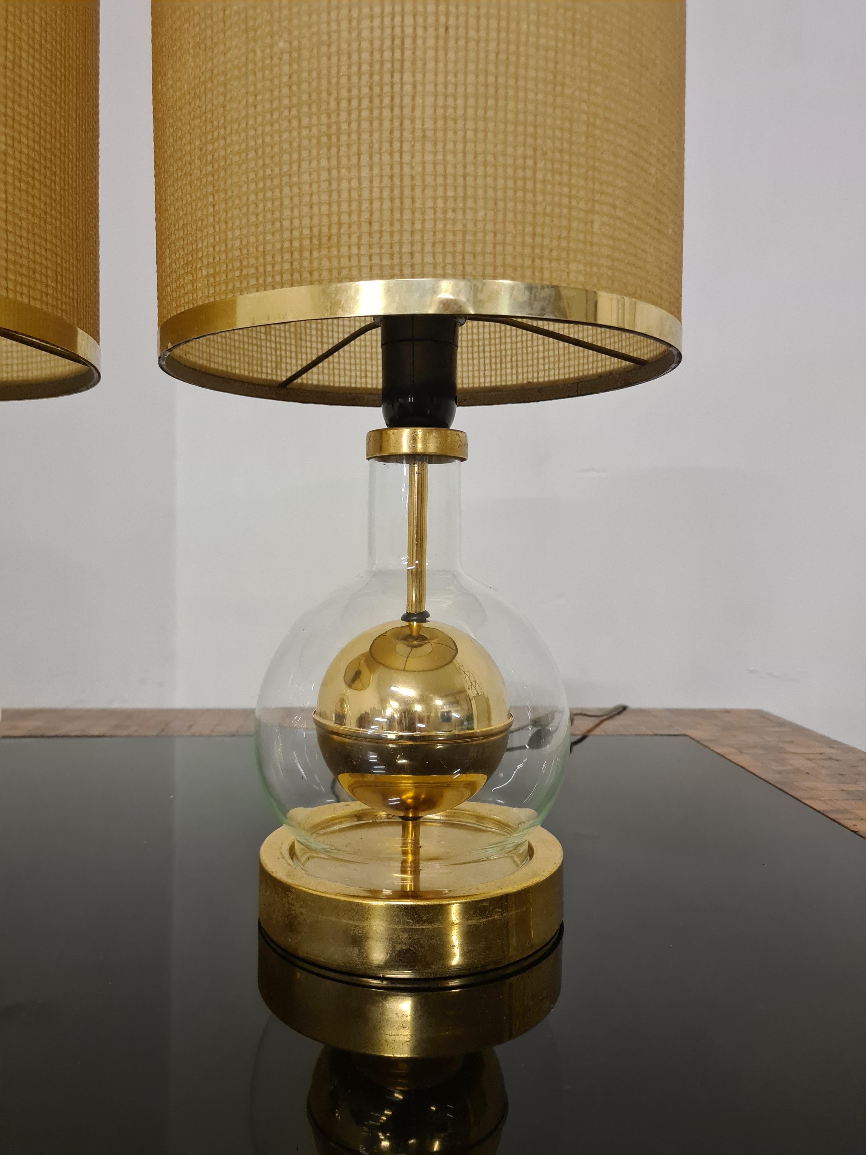 Brass Pair of glass and brass table lamps, 1970s Hollywood Regency style