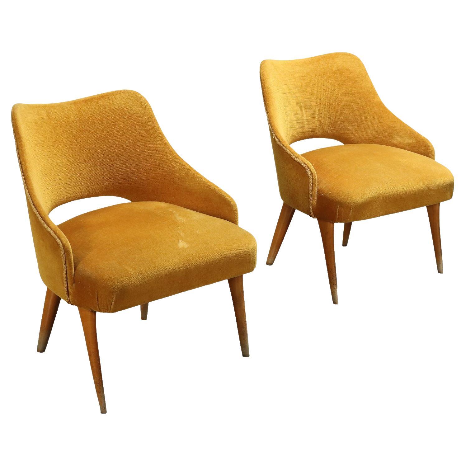 Paire de fauteuils ocre des années 50-60 en vente