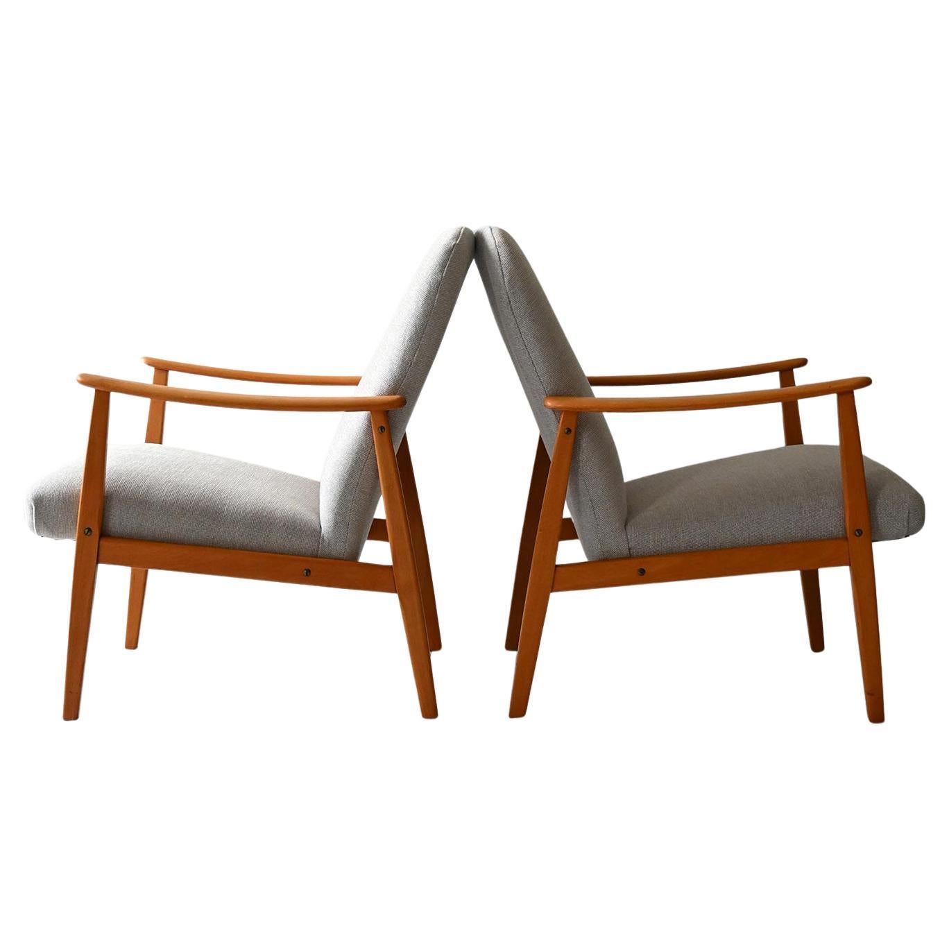 Coppia poltrone scandinave mid-century in rovere in vendita
