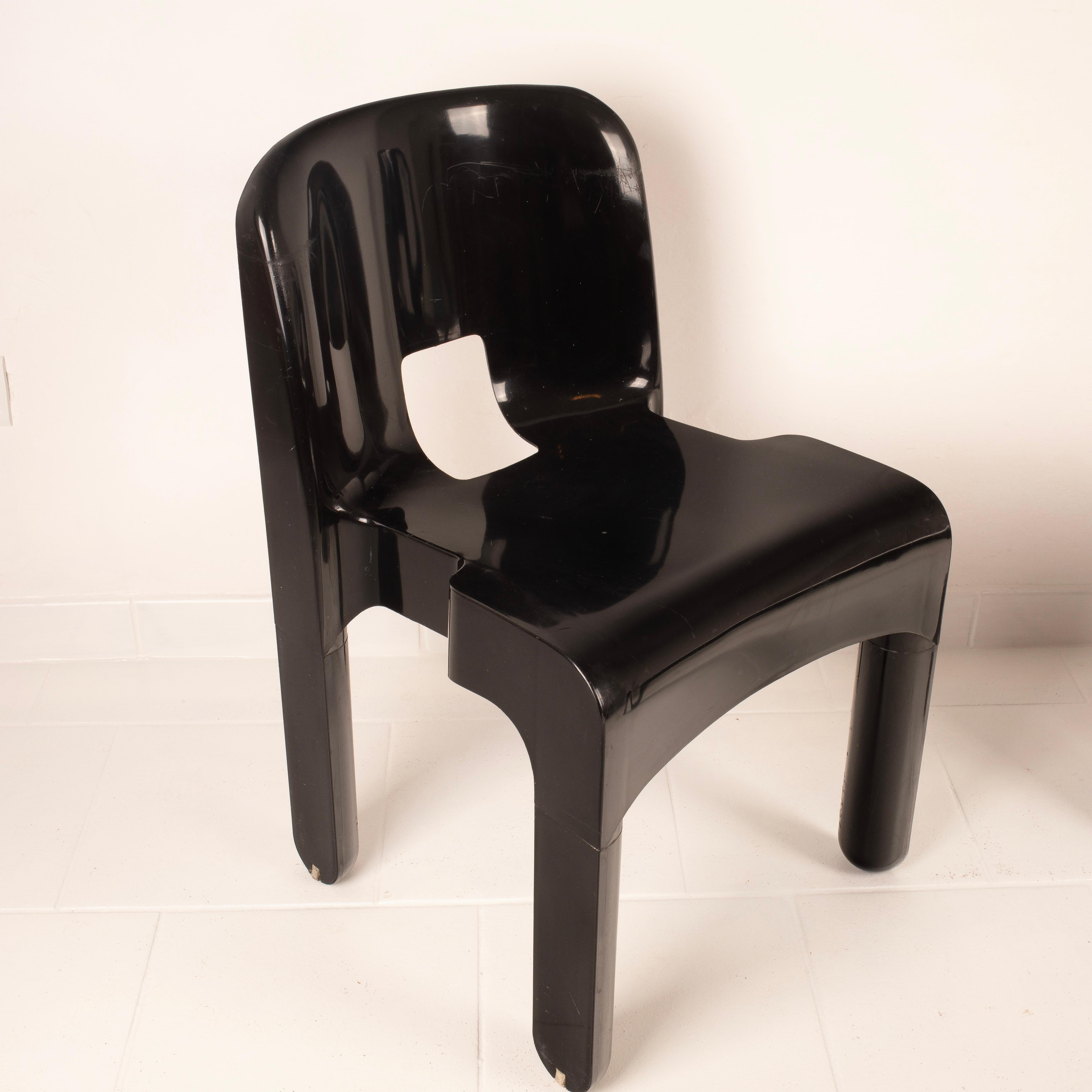 Plastic Pair of Universal Chairs 4869 Black by Joe Colombo for Kartell For Sale