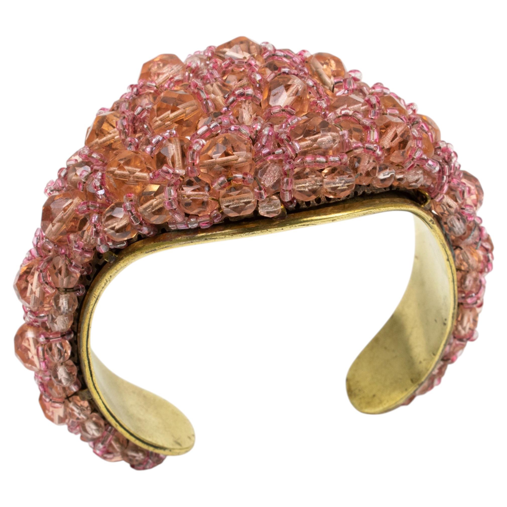 Coppola y Toppo Brazalete de metal dorado con cuentas de cristal rosa