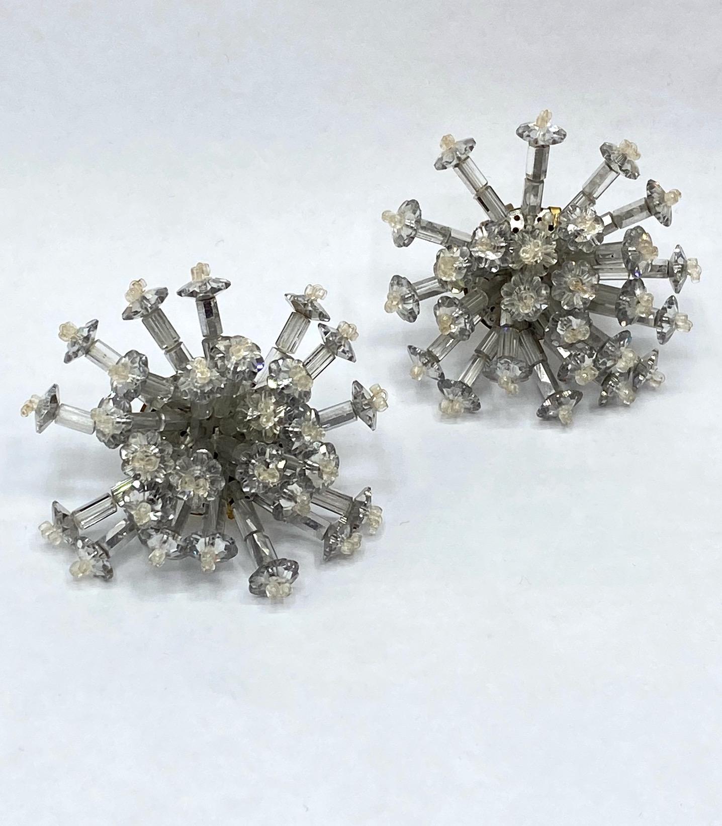 A dramatic large pair of 1950s Starburst or sputnik style earrings by famous brother and sister Italian design team Coppola e Toppo. Each dome shape earrings measures about 2