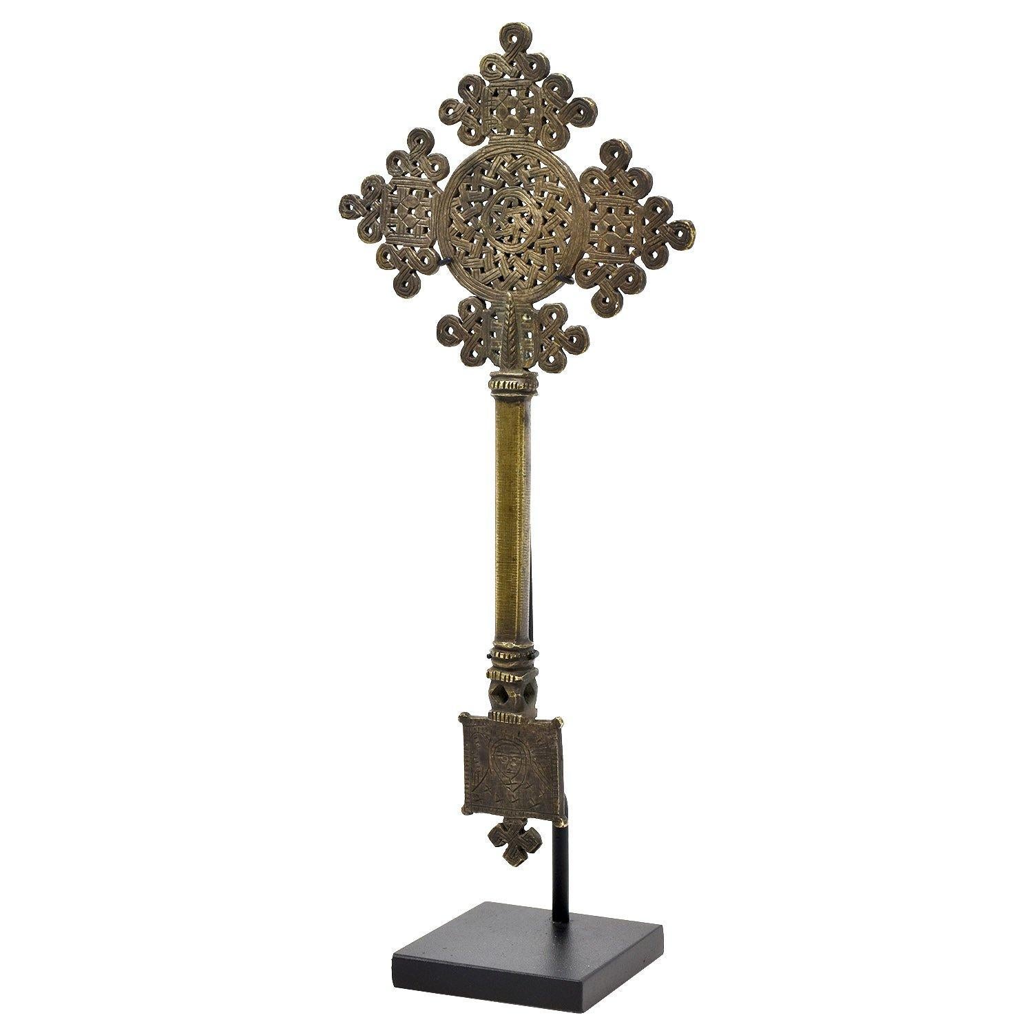 Coptic hand cross, Ethiopia

Carried by hand during services
Ethiopia
Copper alloy
Mid 20th century
Measures: 9 x 4.25 x 0.5 in. / 23 x 11 x 1 cm
Height on custom display stand: 10 in. / 25 cm.