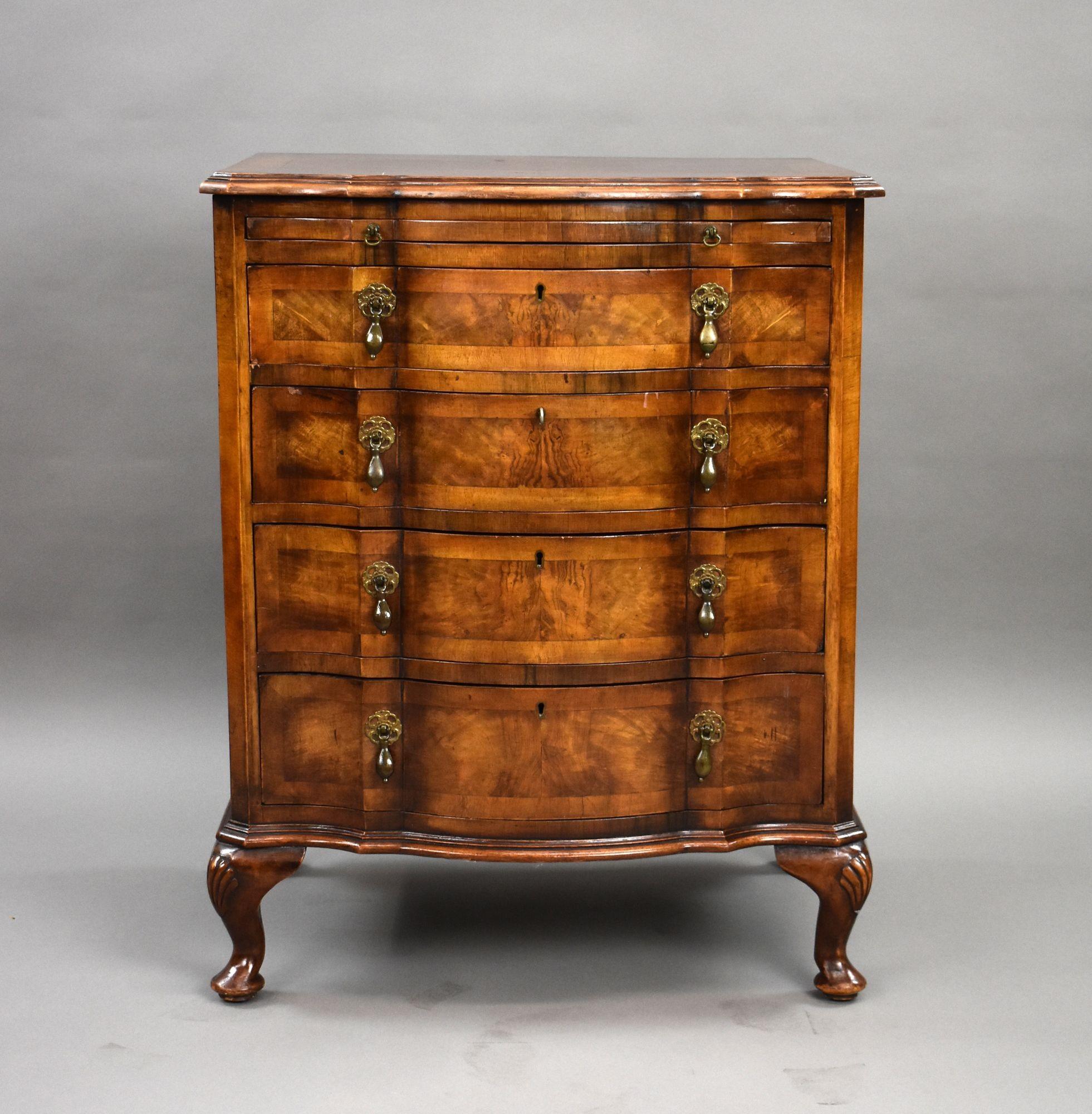 Antique Walnut Serpentine Chest of Drawers
Item Code: LC1376
A fine quality antique walnut serpentine front chest of drawers, beautifully proportioned and standing on cabriole legs with carved shell knees and pad feet. The well-figured walnut