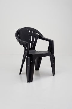 Fauteuil copytopia, chaise en plastique noir, Pierre Castignola