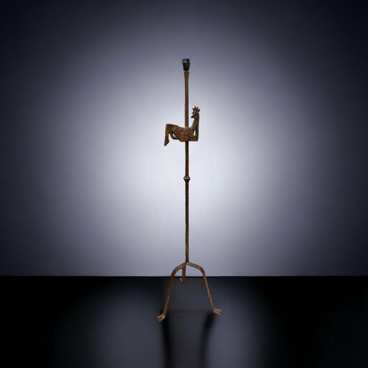 Wrought-iron floor lamp attributed to Jean Touret for Atelier Marolles, France, circa 1955. Rare large (140 cm) wrought-iron floor lamp with painted finish. Good condition. Sold without shade.

Known to insiders, particularly for his work in sacred