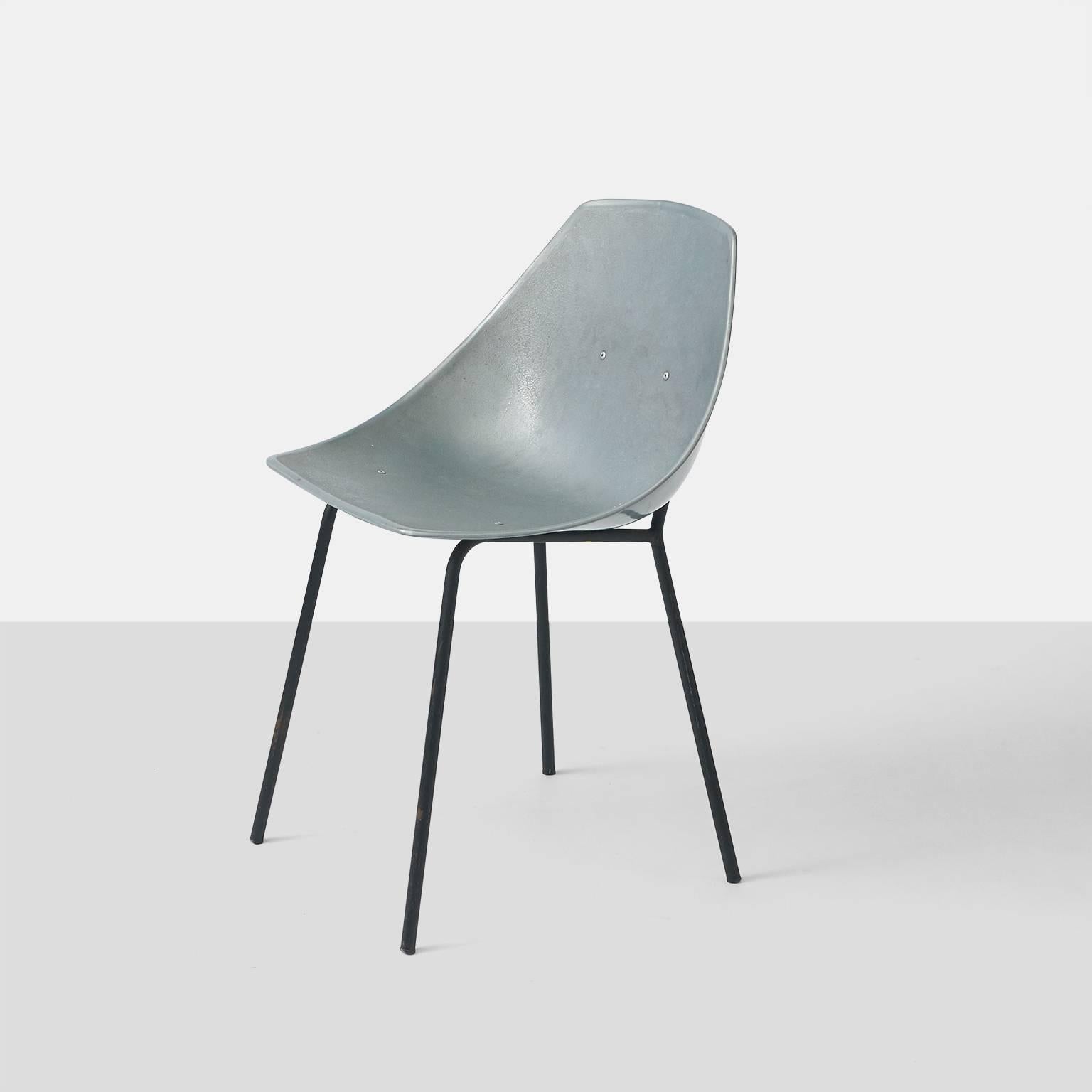 A side chair by Pierre Guariche in gray plastic with tubular black metal frame. This model ‘Coquillage’ was manufactured by Meurop and retains the original label.
Belgium, 1960s.