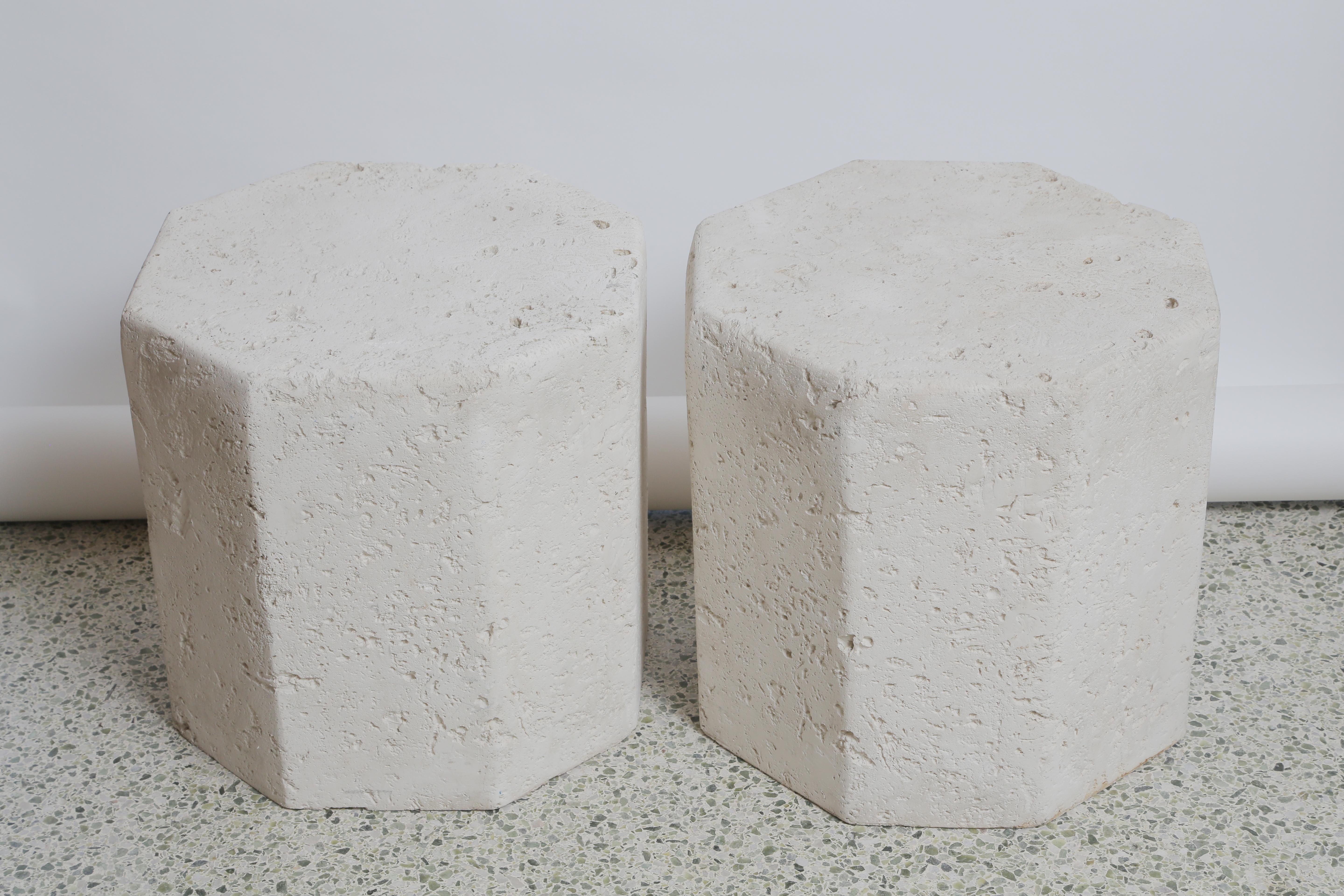 Pair of cast coquina stone tables or stools.