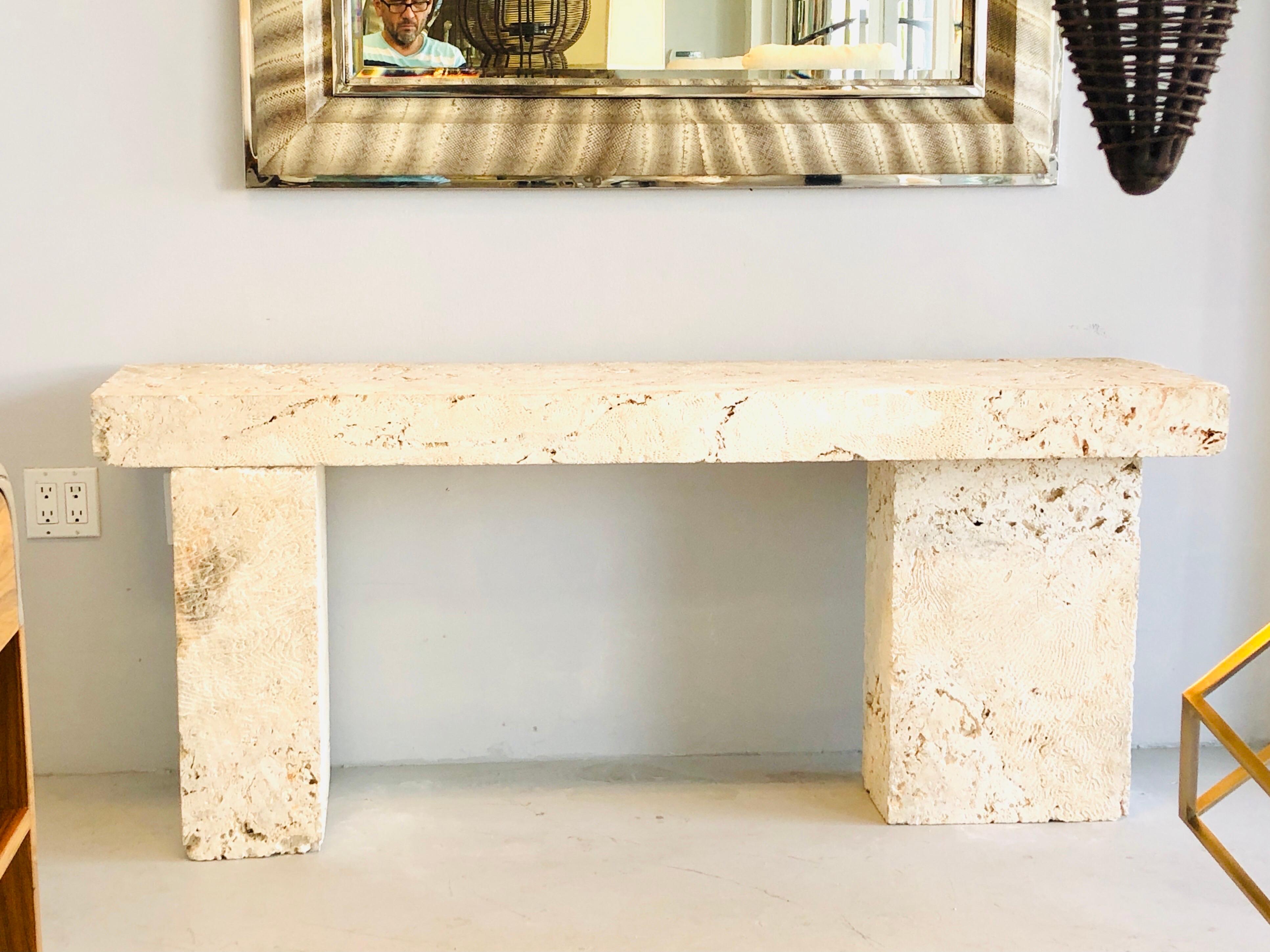 A massive console table. Simple Minimalist design, the thick top rests on the massive bases, bases are 9