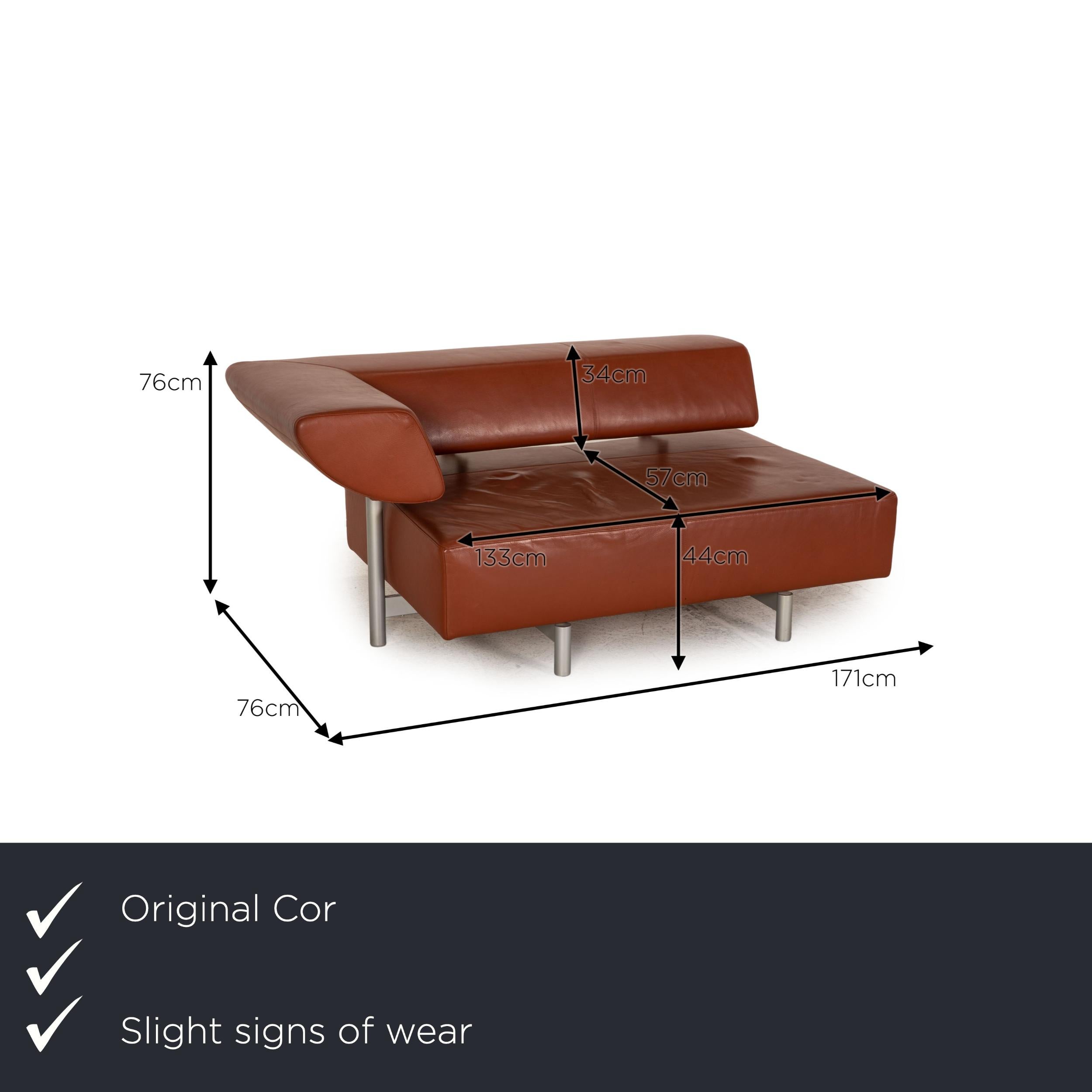 We present to you a Cor Arthe leather sofa brown two-seater couch.

Product measurements in centimeters:

depth: 96
width: 171
height: 76
seat height: 44
rest height: 76
seat depth: 57
seat width: 133
back height: 34.

 