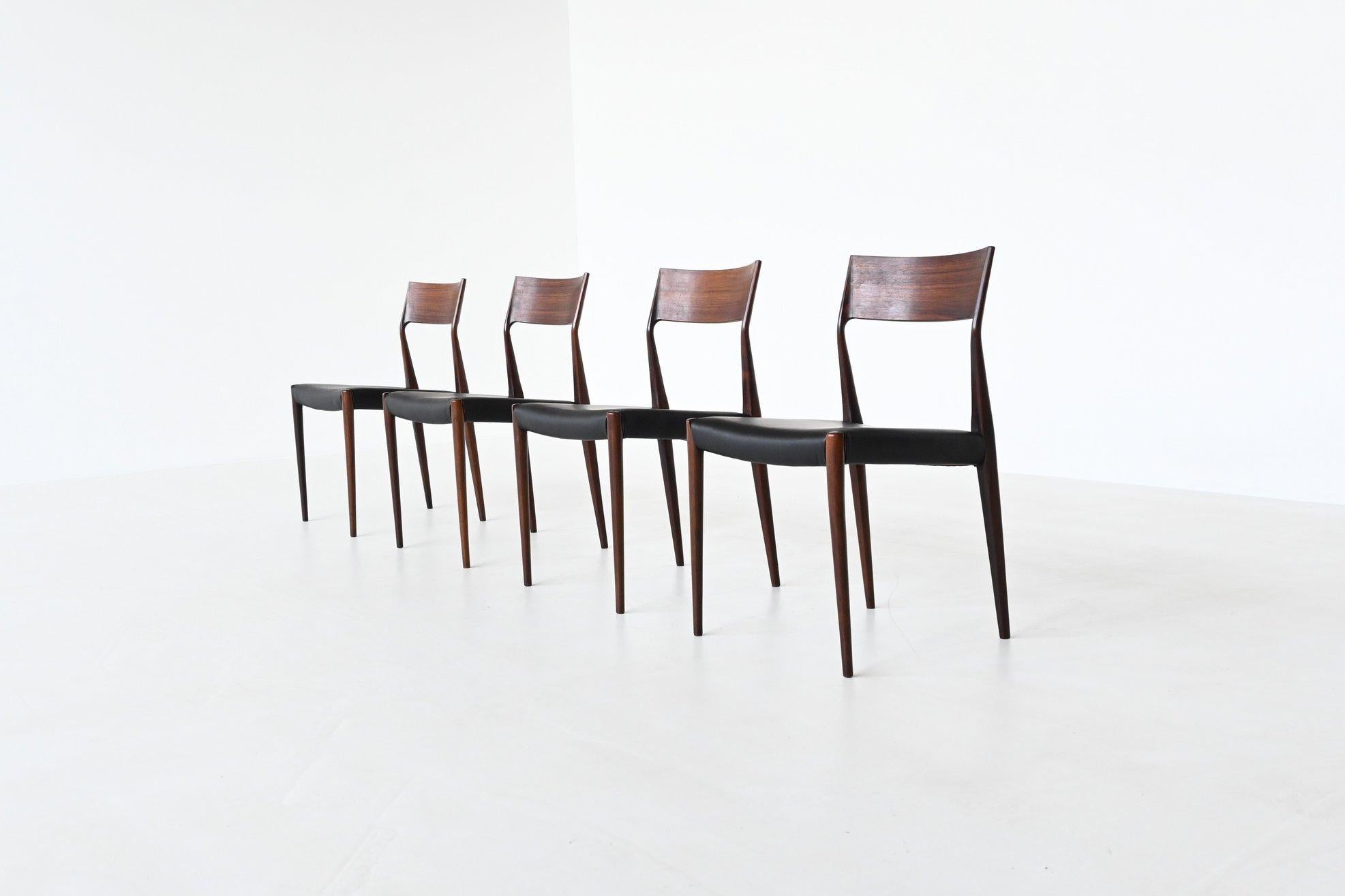 Beautiful shaped dining chairs model EJ designed by Cor Bontenbal for Fristho Franeker, The Netherlands 1960. They are made of nicely grained solid rosewood and the seats are upholstered with high quality black aniline leather. The chairs look a lot