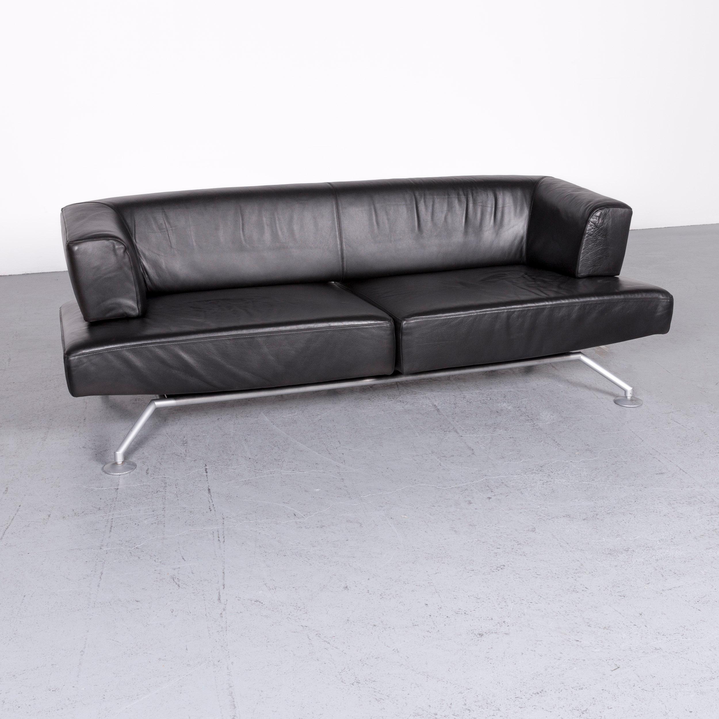 We bring to you a COR Circum designer leather sofa black genuine leather three-seat couch.

Product measurements in centimeters:

Depth 90
Width 215
Height 70
Seat-height 45
Rest-height 70
Seat-depth 60
Seat-width 155
Back-height 40.

  