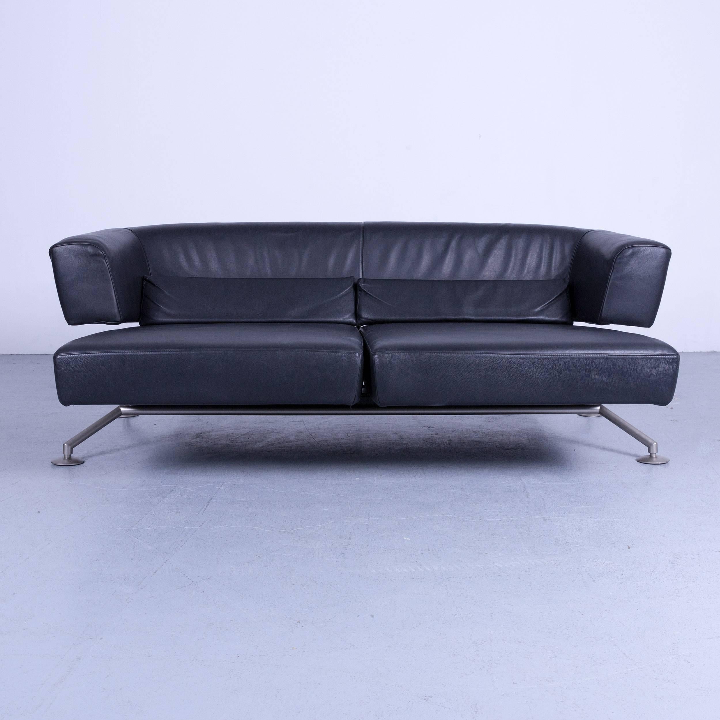 Black colored original COR Circum designer leather sofa in a minimalistic and modern design, made for pure comfort and flexibility.