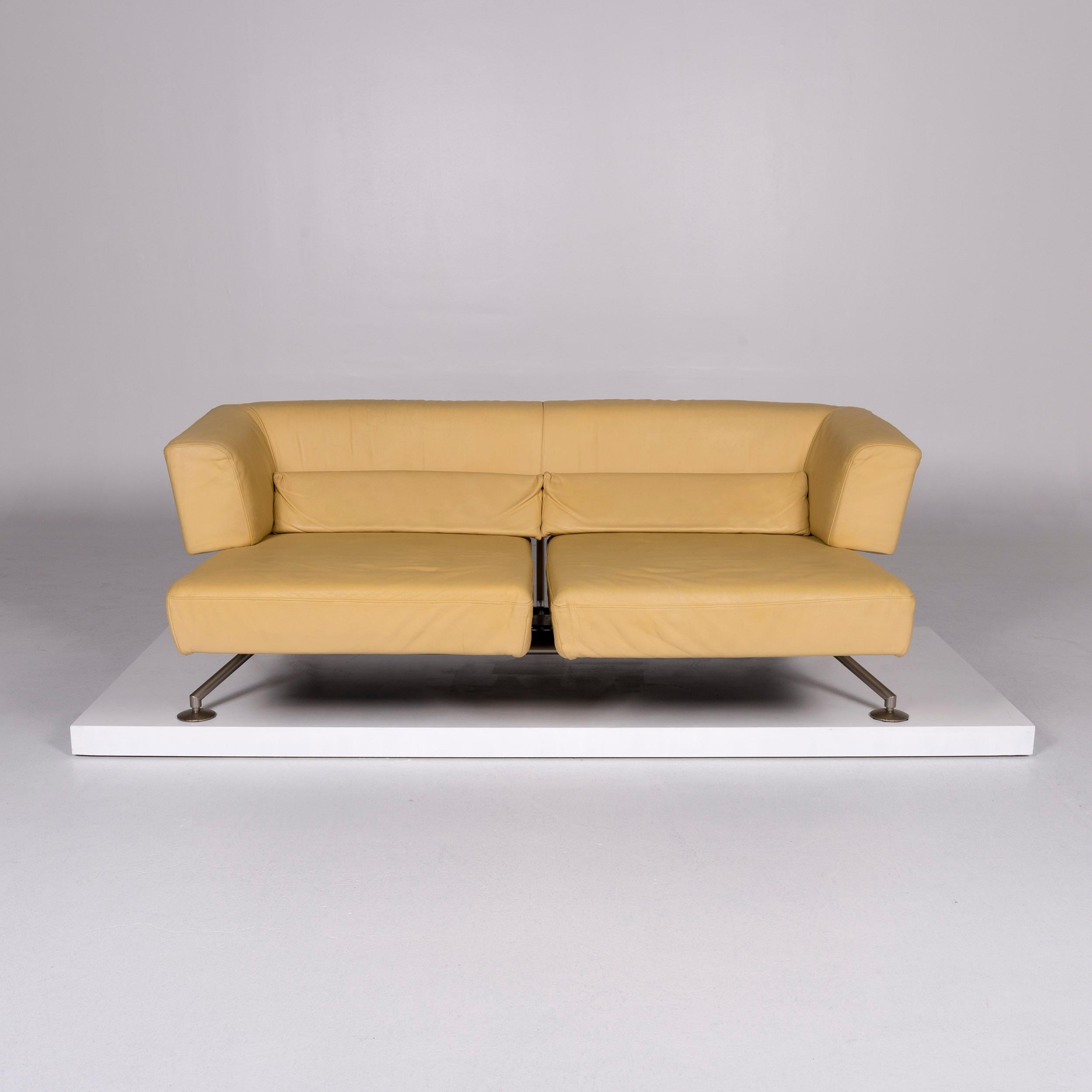 We bring to you a COR circum leder sofa Gelb Zweisitzer couch.
 
 Product measurements in centimeters:
 
Depth 90
Width 215
Height 70
Seat-height 45
Rest-height 70
Seat-depth 60
Seat-width 155
Back-height 40.
 