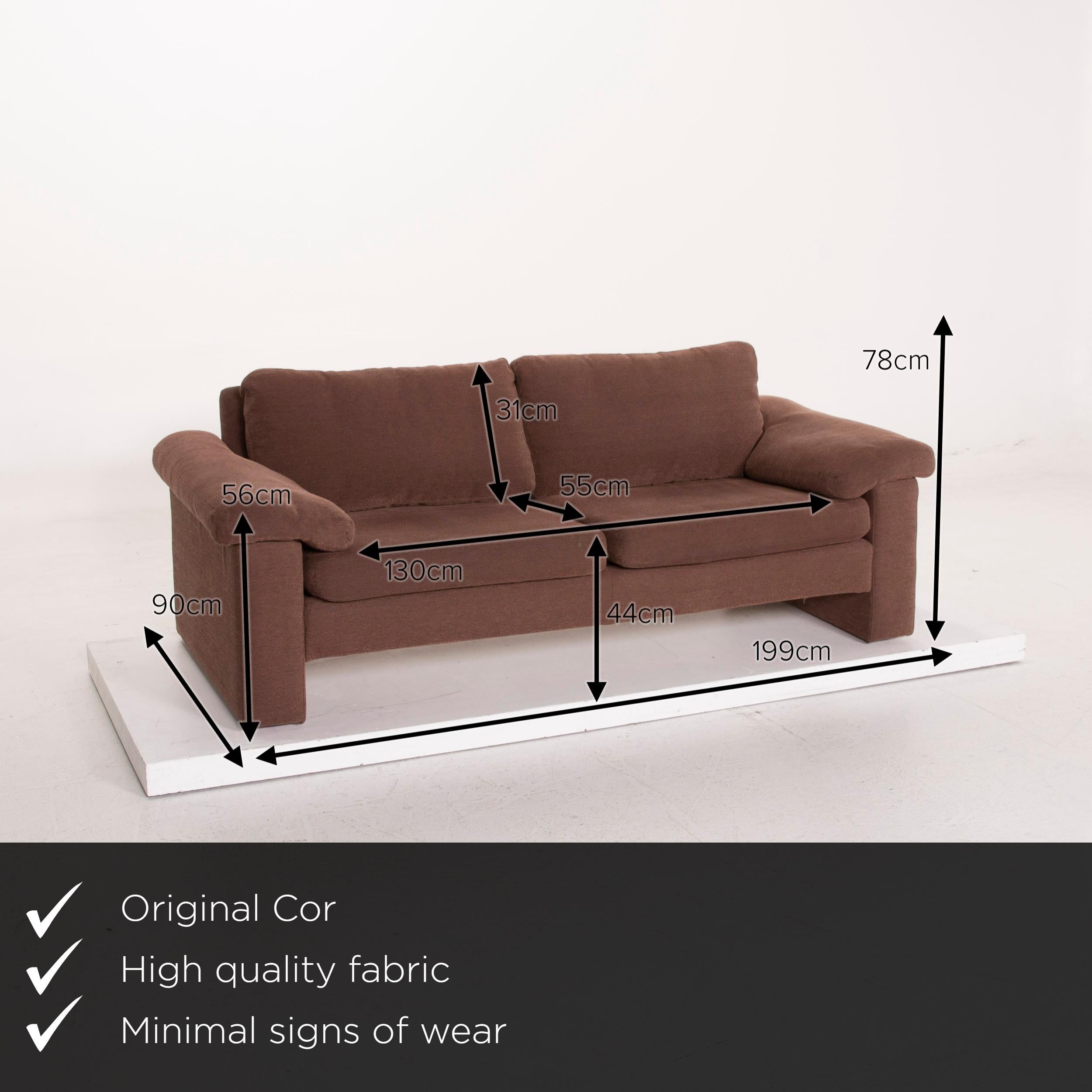 We present to you a COR Conseta fabric sofa brown three-seat.


 Product measurements in centimeters:
 

Depth 97
Width 85
Height 107
Seat height 46
Rest height 58
Seat depth 56
Seat width 57
Back height 63.
 