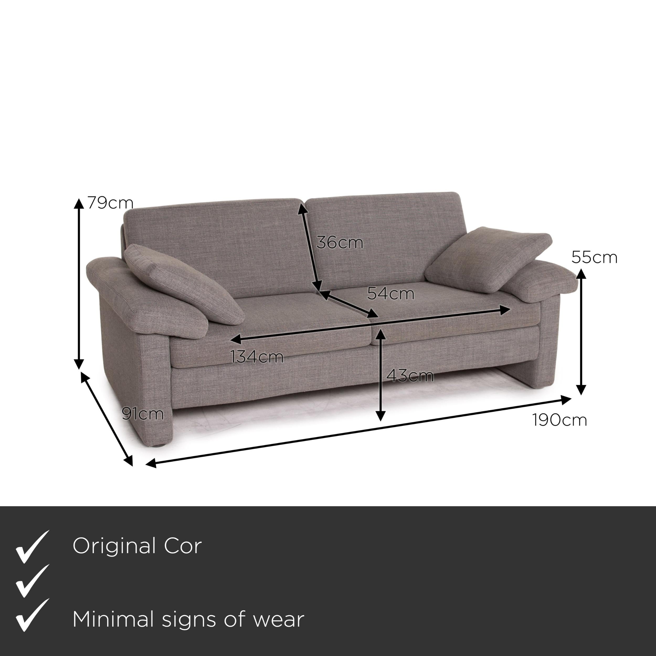 We present to you a COR Conseta fabric sofa gray two-seater couch.
 

 Product measurements in centimeters:
 

Depth: 91
Width: 190
Height: 79
Seat height: 43
Rest height: 55
Seat depth: 54
Seat width: 134
Back height: 36.
 