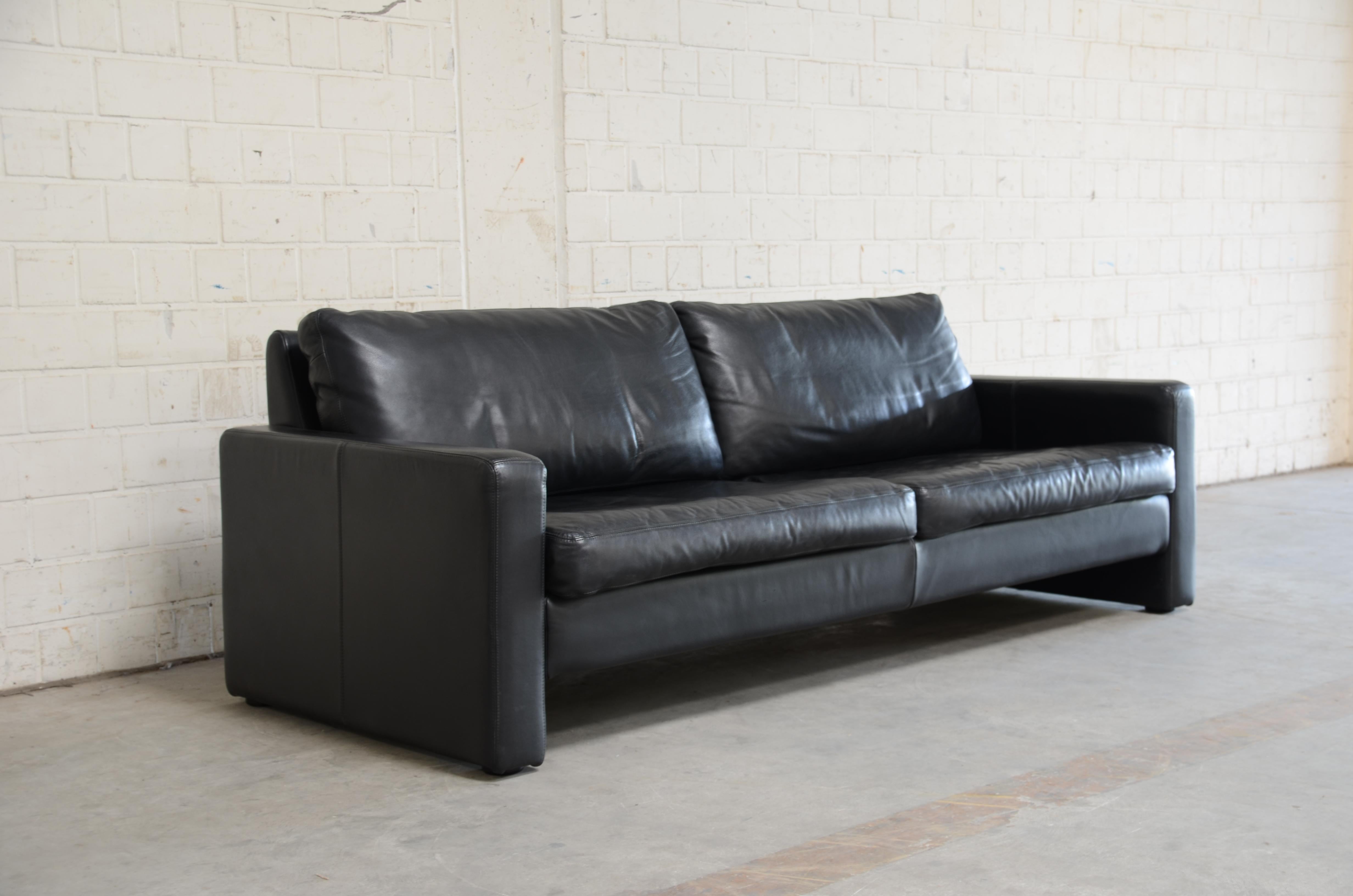 Cor leather sofa model Conseta from the 1990s.
Black aniline leather. The leather has a soft touch.
Comfortable sofa with decent design.
Design by Friedrich Wilhelm Möller
A German masterpiece of functional design.