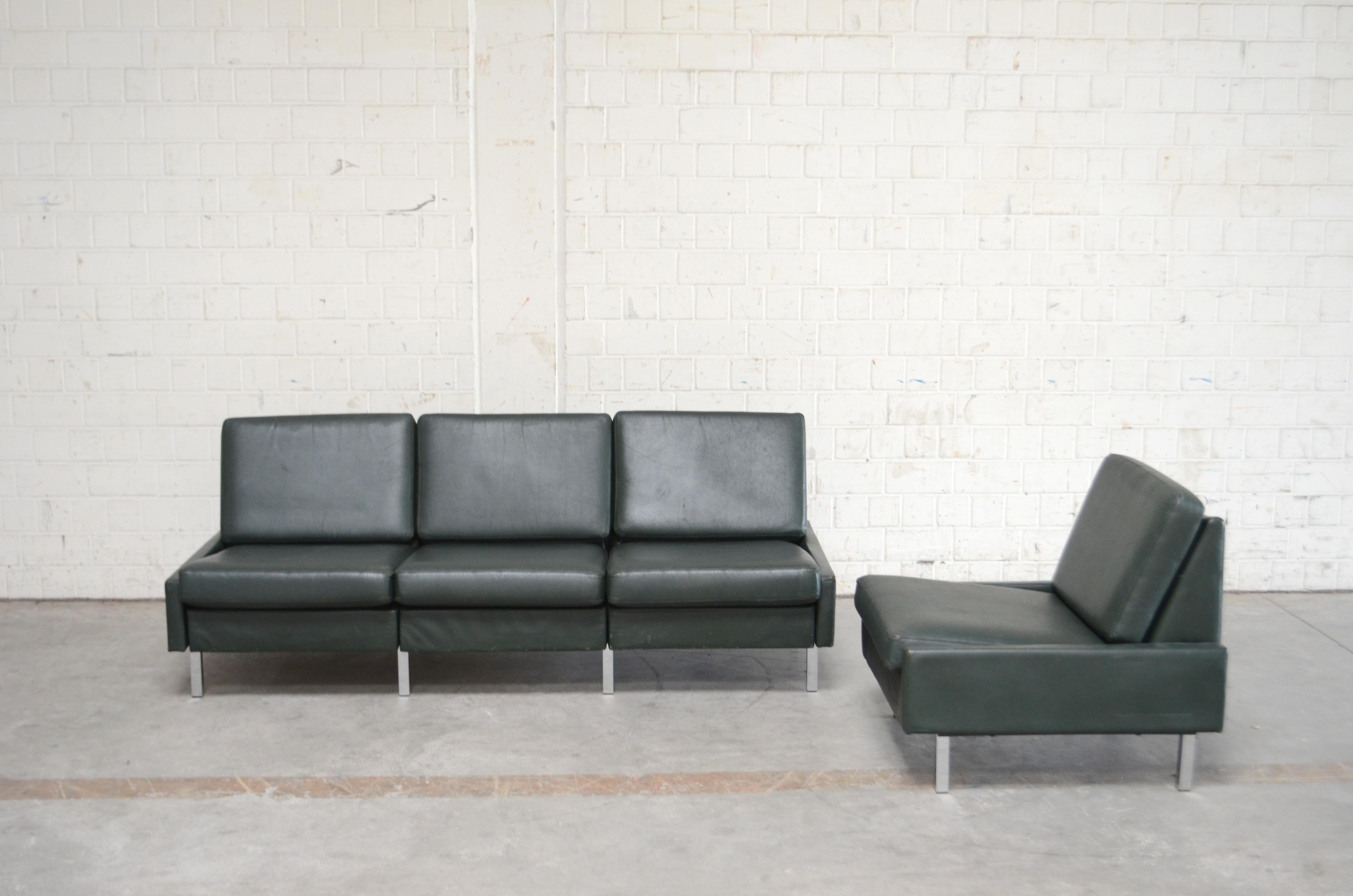 COR leather sofa model conseta from the 1960s.
It´s a module sofa that can converted into 2 x seater sofas or as it seen in a 3-seat sofa and 1 chair.
Green leather and chrome feet.
Design by Friedrich Wilhelm Möller.

Sofa 3er

Measures: