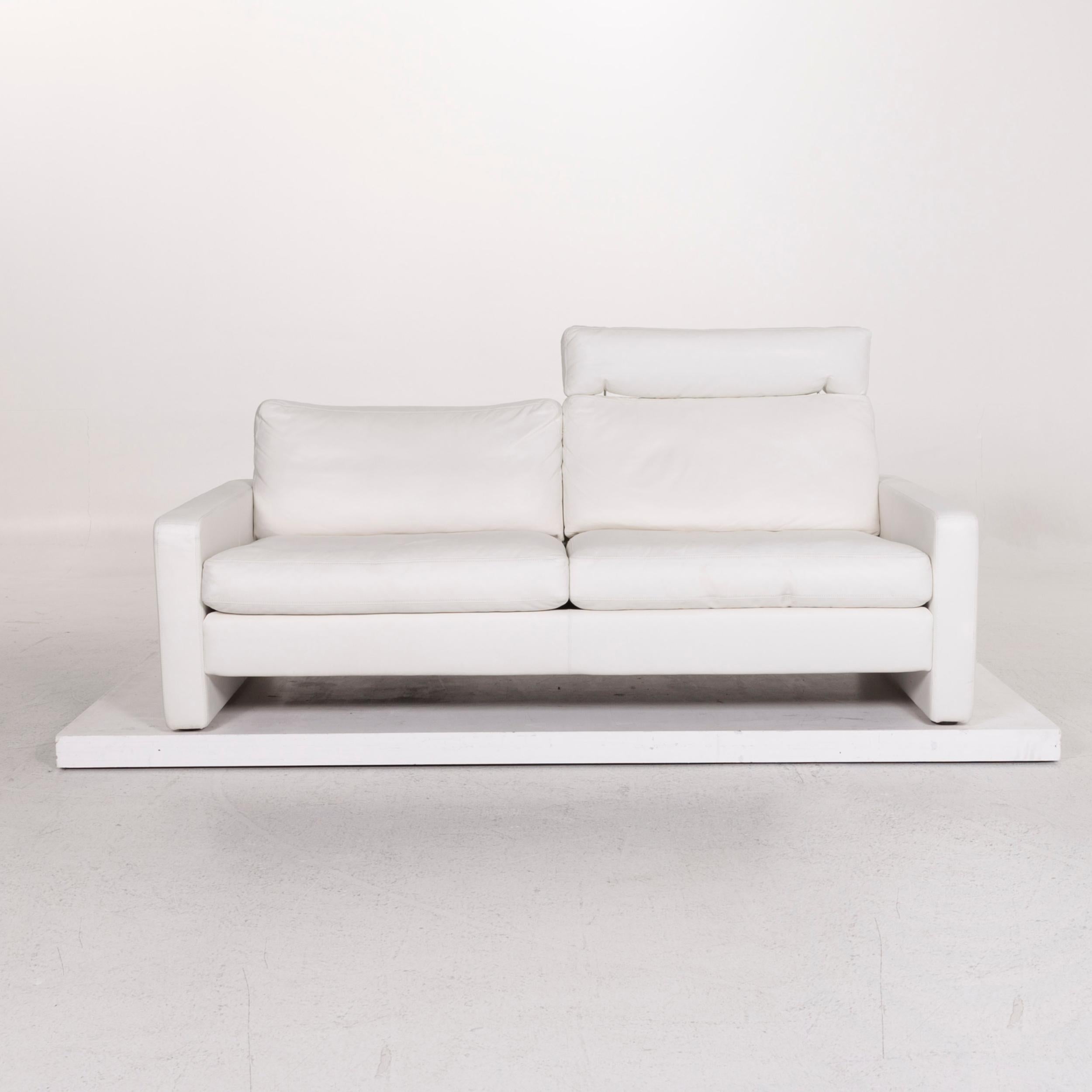 We bring to you a Cor Conseta leather sofa white two-seat couch.
 
 

 Product measurements in centimeters:
 

Depth 96
Width 204
Height 81
Seat-height 55
Rest-height 64
Seat-depth 63
Seat-width 180
Back-height 38.
 