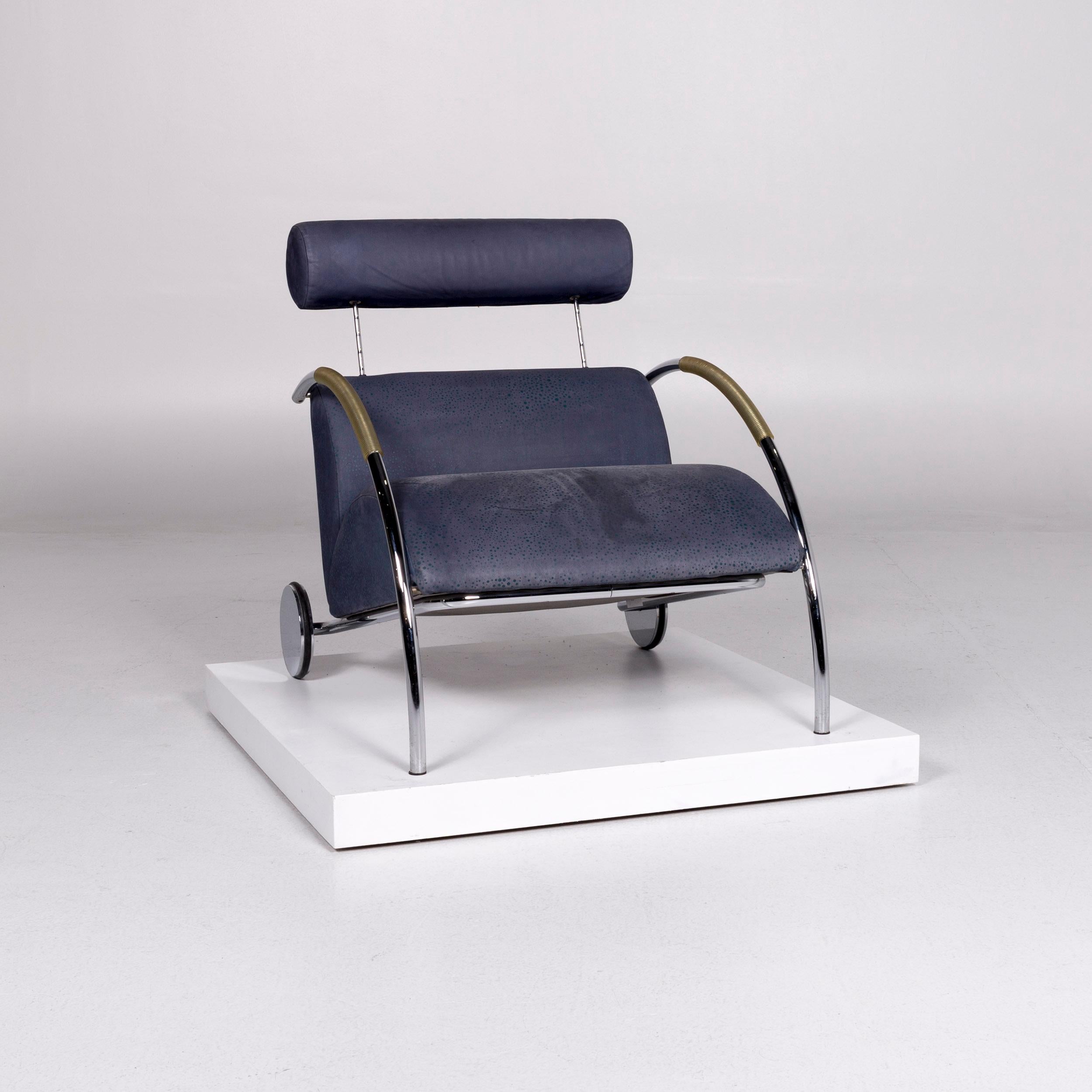 We bring to you a COR cycle leather armchair blue feature Peter Maly.

 Product measurements in centimeters:
 
Depth 86
Width 73
Height 72
Seat-height 43
Rest-height 60
Seat-depth 53
Seat-width 68
Back-height 31.
       