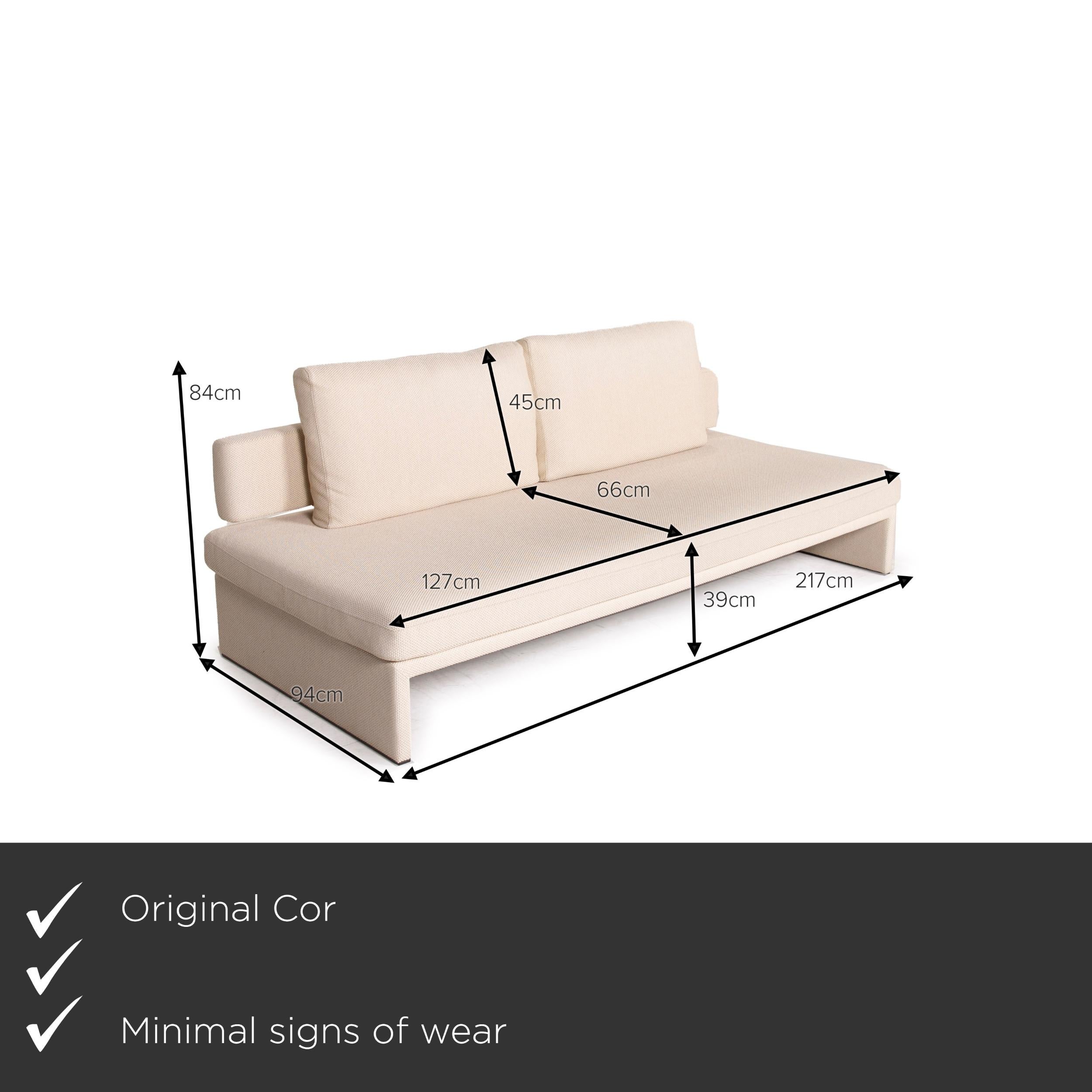 We present to you a COR fabric sofa cream three-seater.
 

 Product measurements in centimeters:
 

Depth: 94
Width: 217
Height: 84
Seat height: 39
Rest height: 27
Seat depth: 66
Seat width: 217
Back height: 45.
 